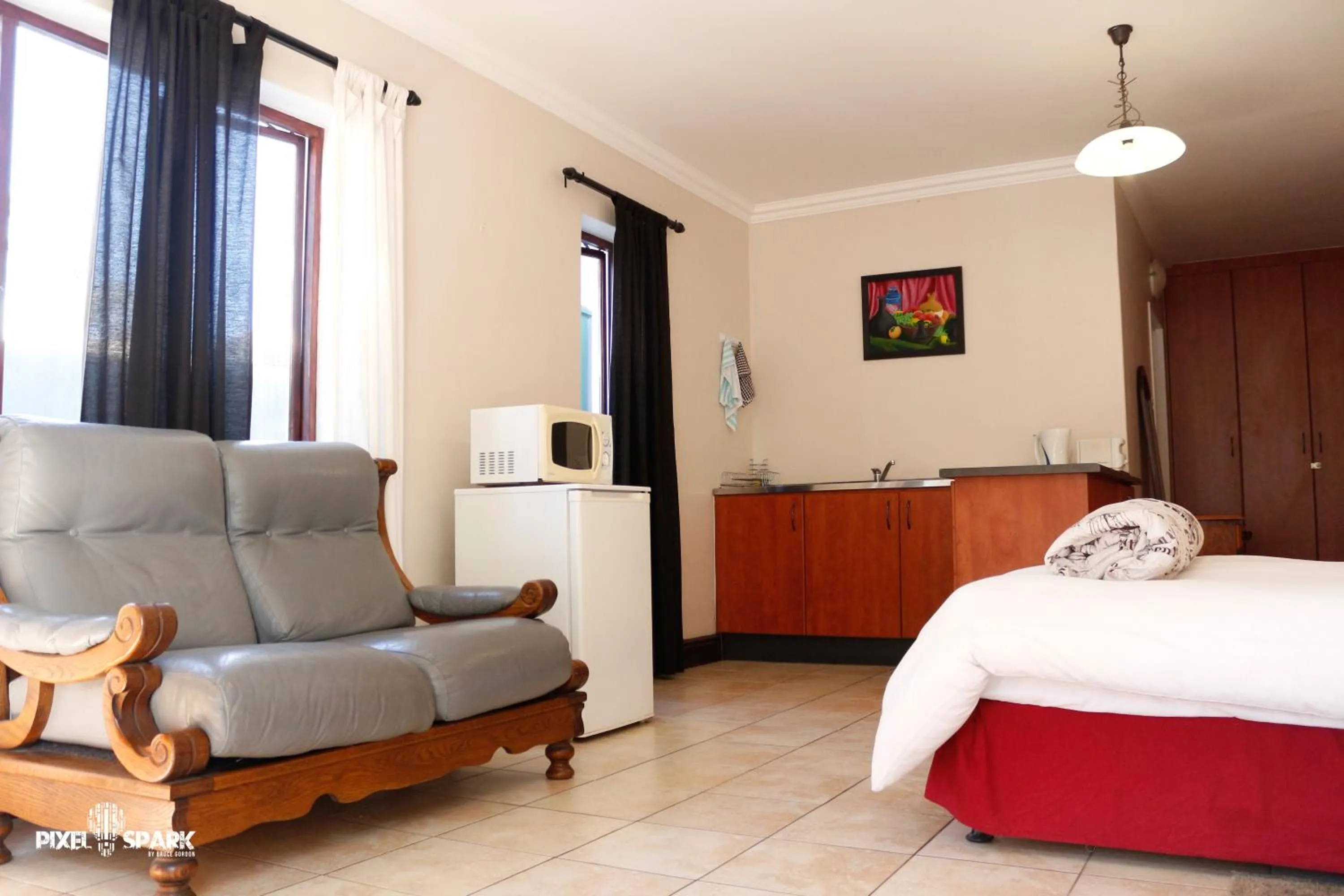 Living room, Bed in Tyday Accommodation
