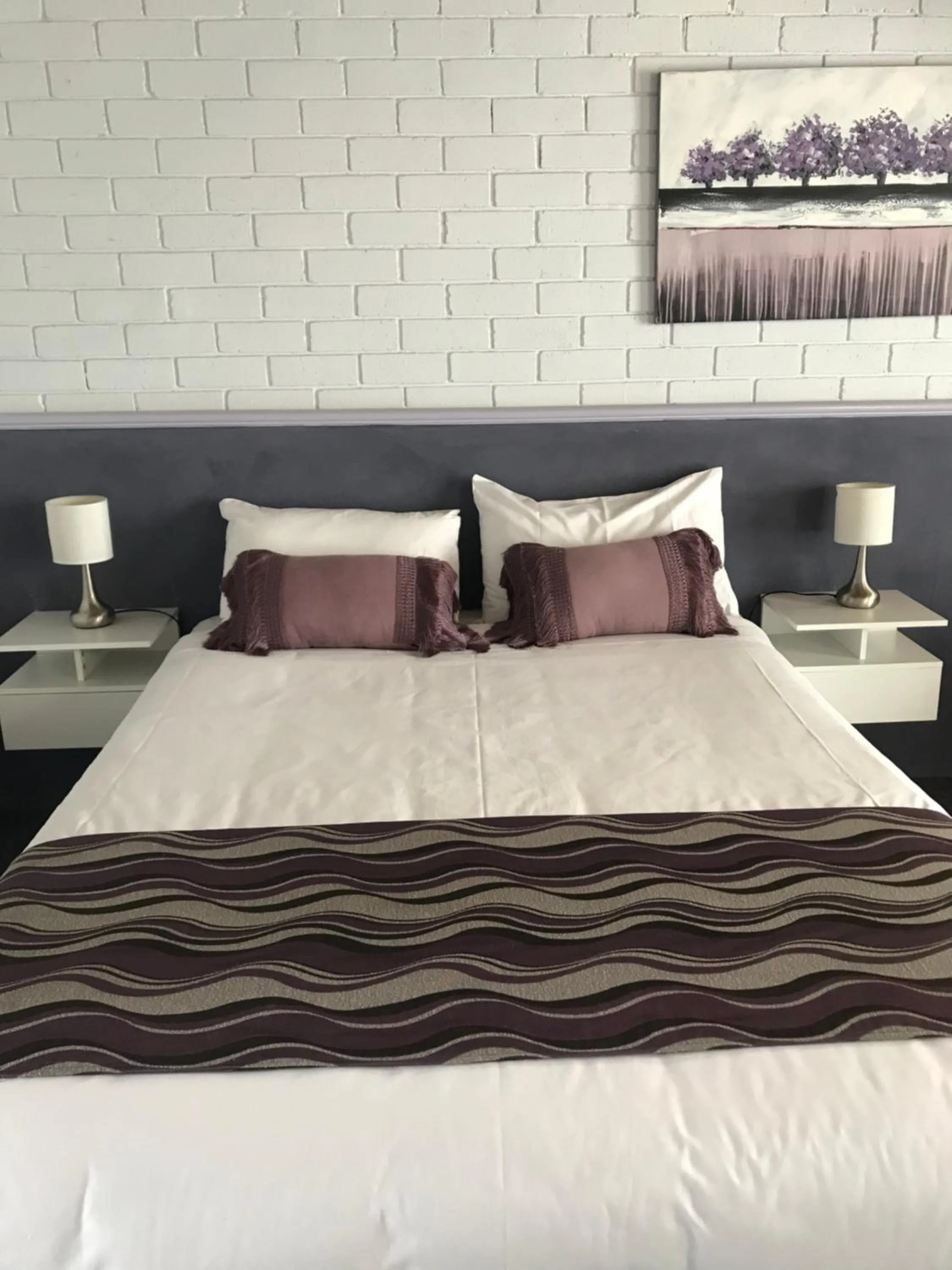 Bed in Bakery Park Motor Inn