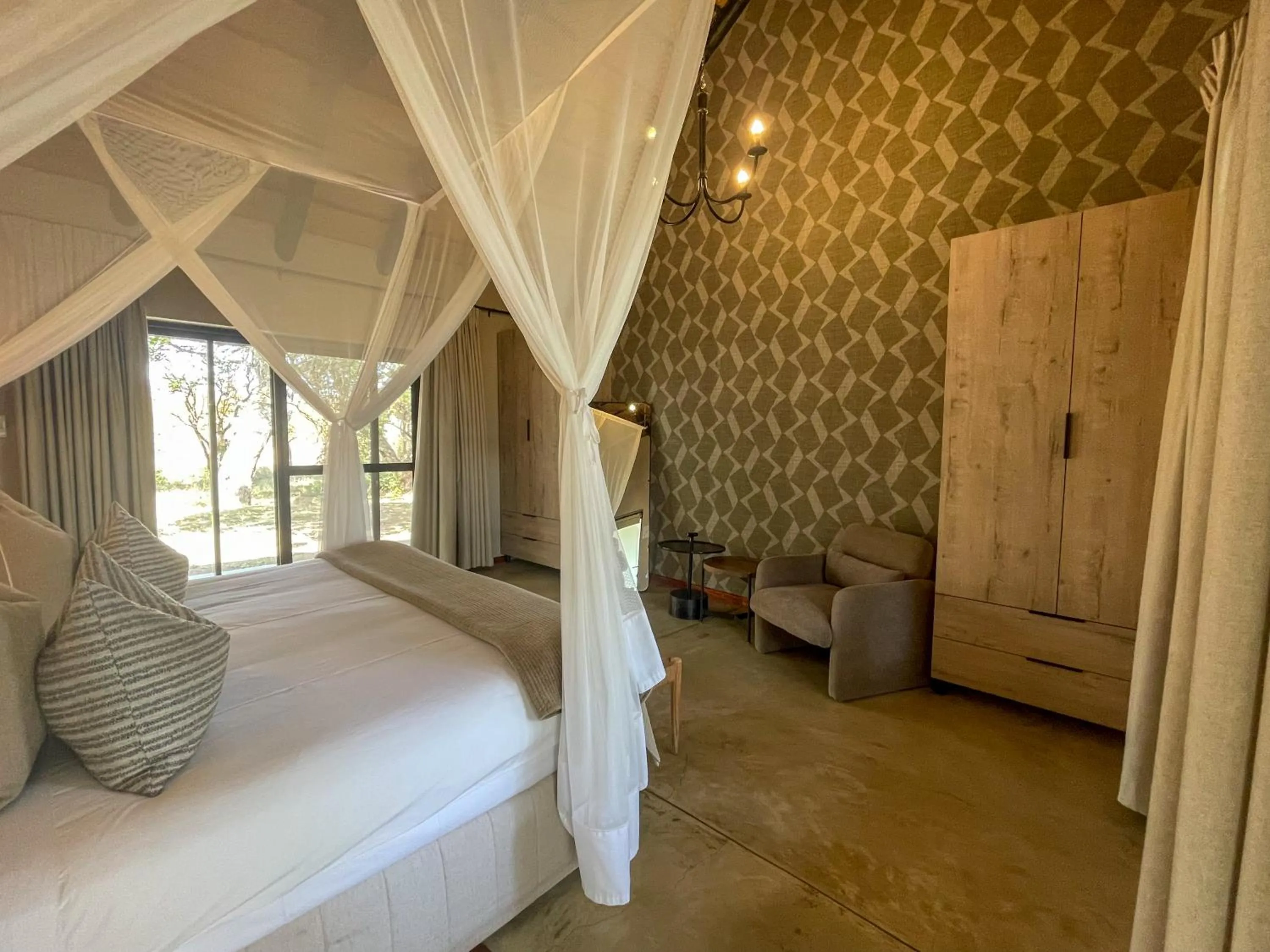 Bed in Xanatseni Private Camp