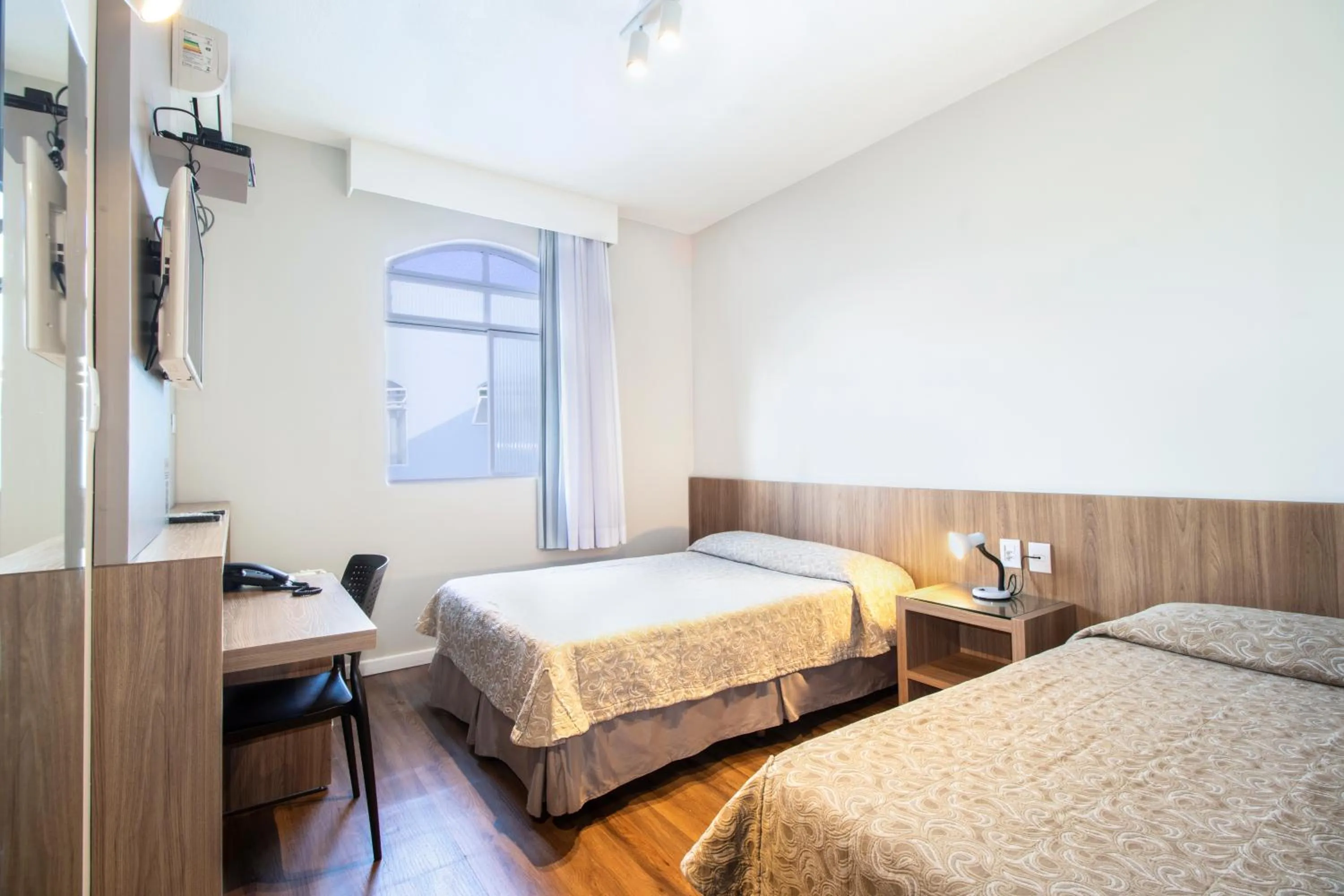 Photo of the whole room, Bed in Real Hotel