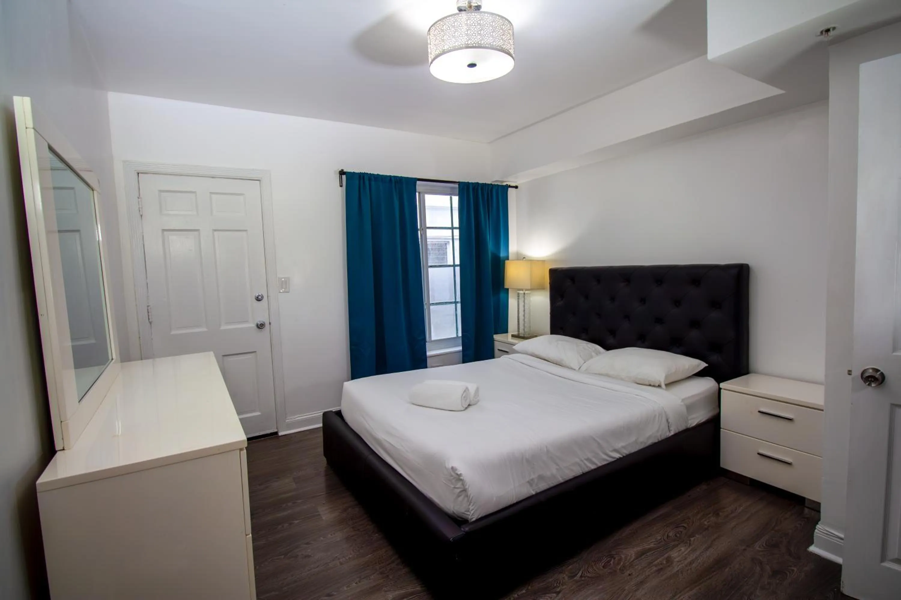 Bed in Courtyard Apartments Part of the Oasis Casita Collection