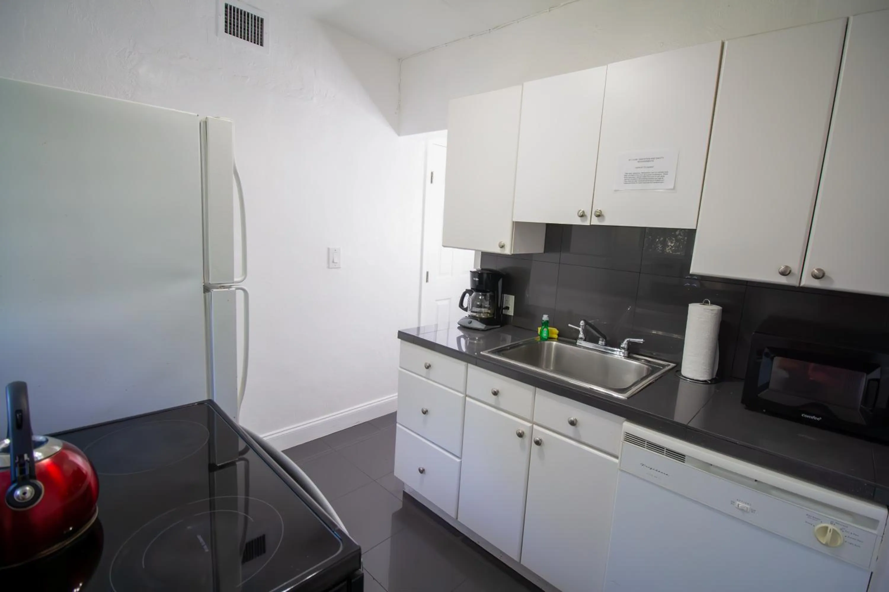 Kitchen or kitchenette in Courtyard Apartments Part of the Oasis Casita Collection