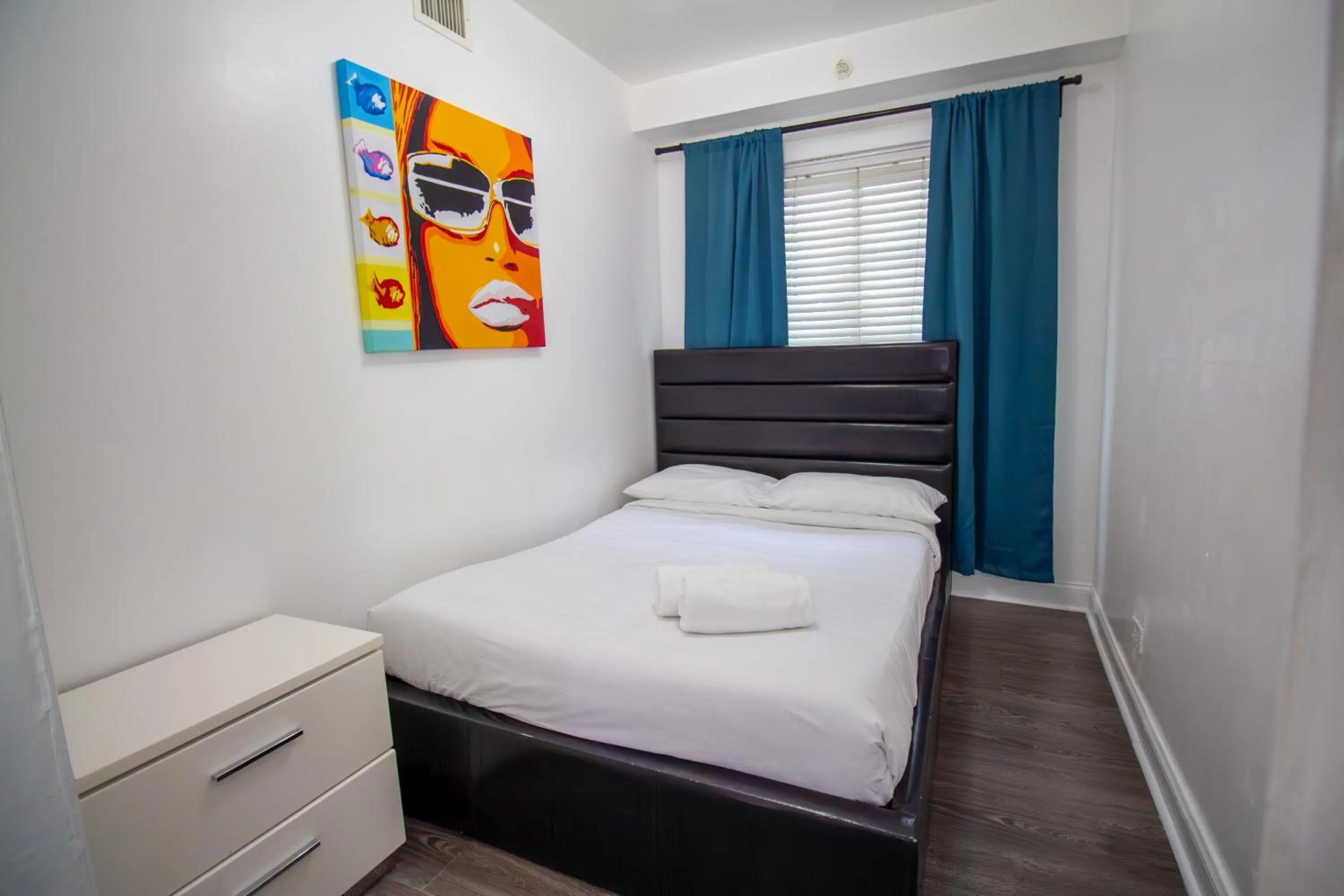 Bed in Courtyard Apartments Part of the Oasis Casita Collection