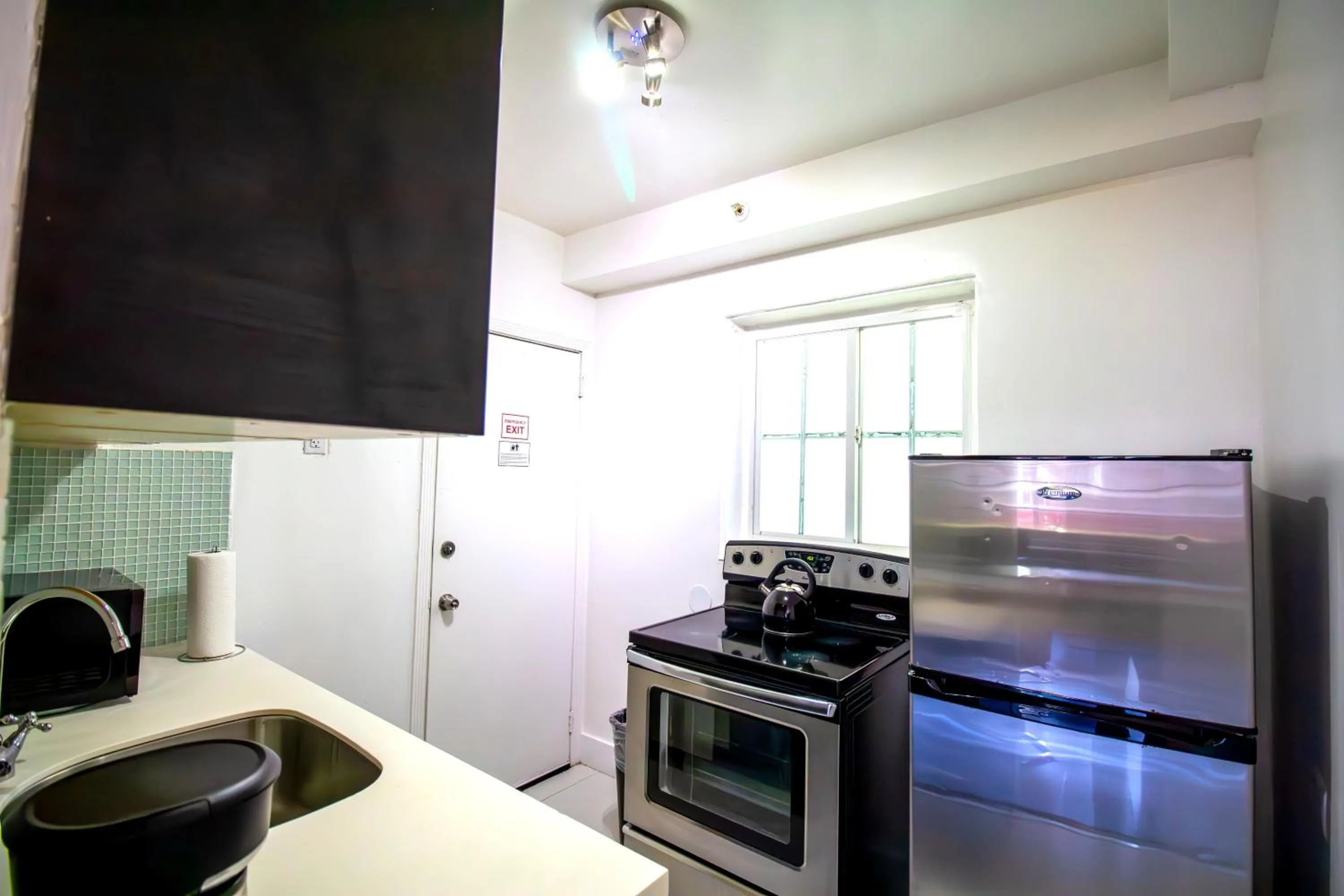Kitchen or kitchenette in Courtyard Apartments Part of the Oasis Casita Collection