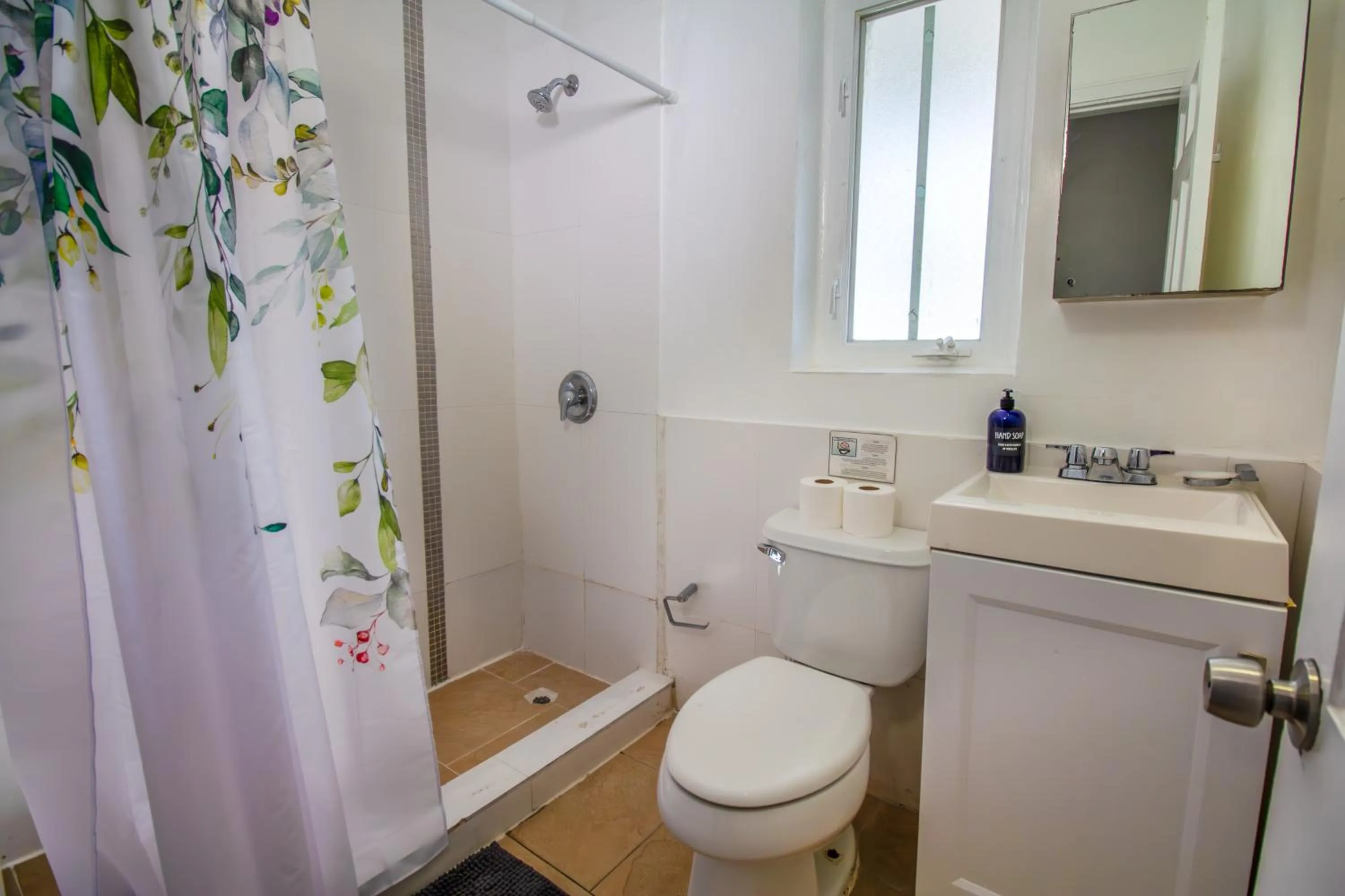 Shower in Courtyard Apartments Part of the Oasis Casita Collection