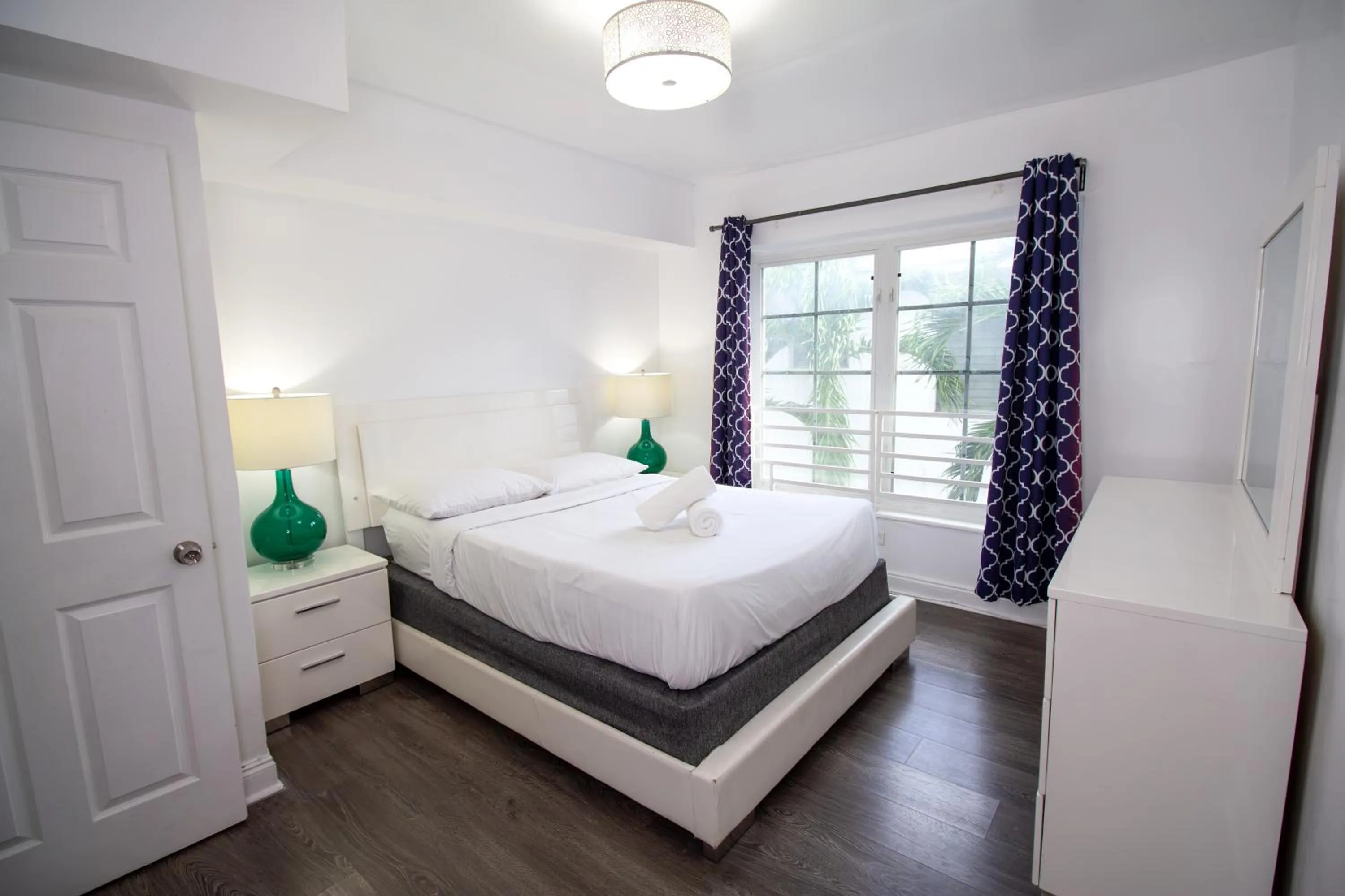 Bed in Courtyard Apartments Part of the Oasis Casita Collection