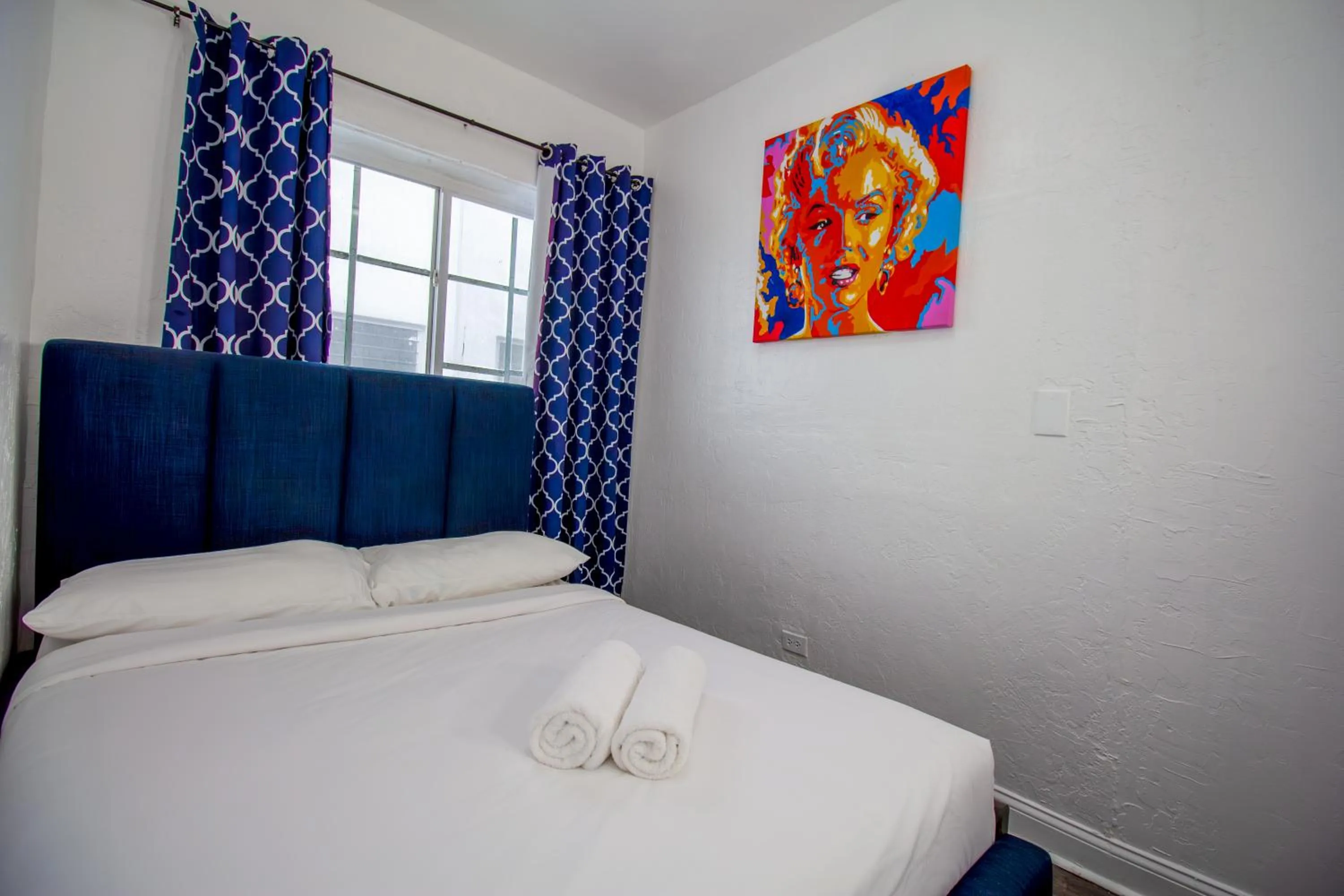 Bed in Courtyard Apartments Part of the Oasis Casita Collection