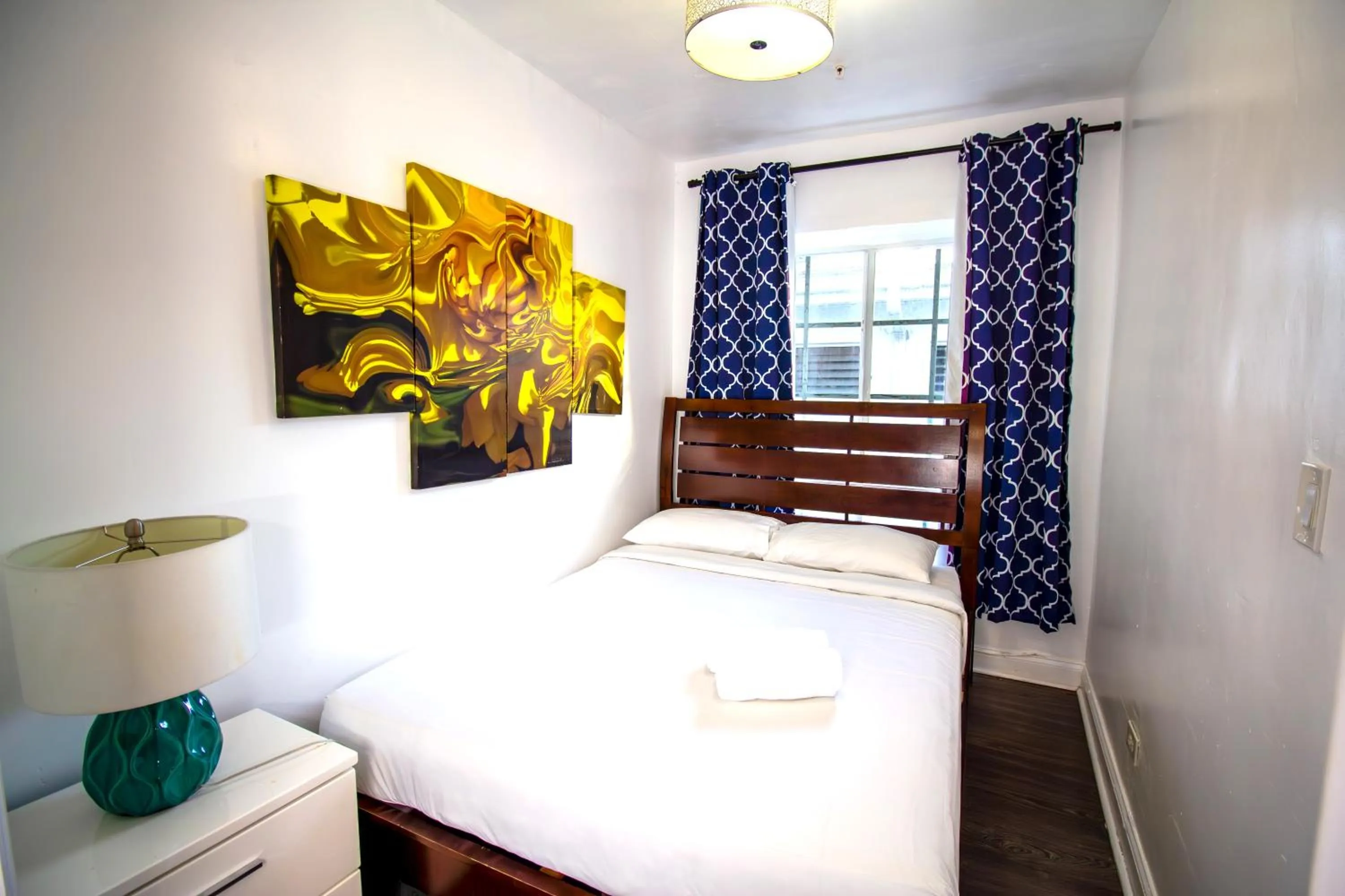 Bed in Courtyard Apartments Part of the Oasis Casita Collection