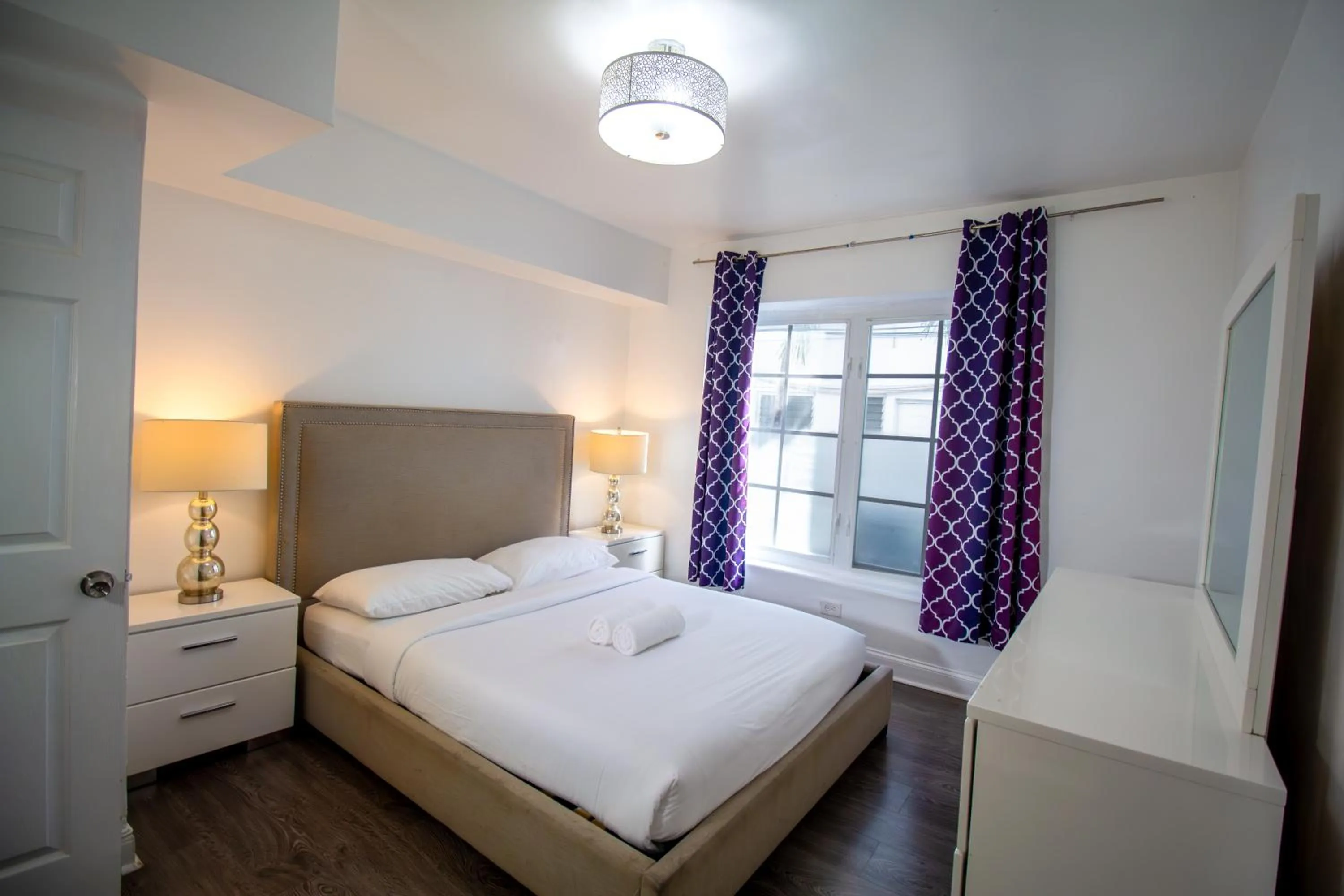 Bed in Courtyard Apartments Part of the Oasis Casita Collection