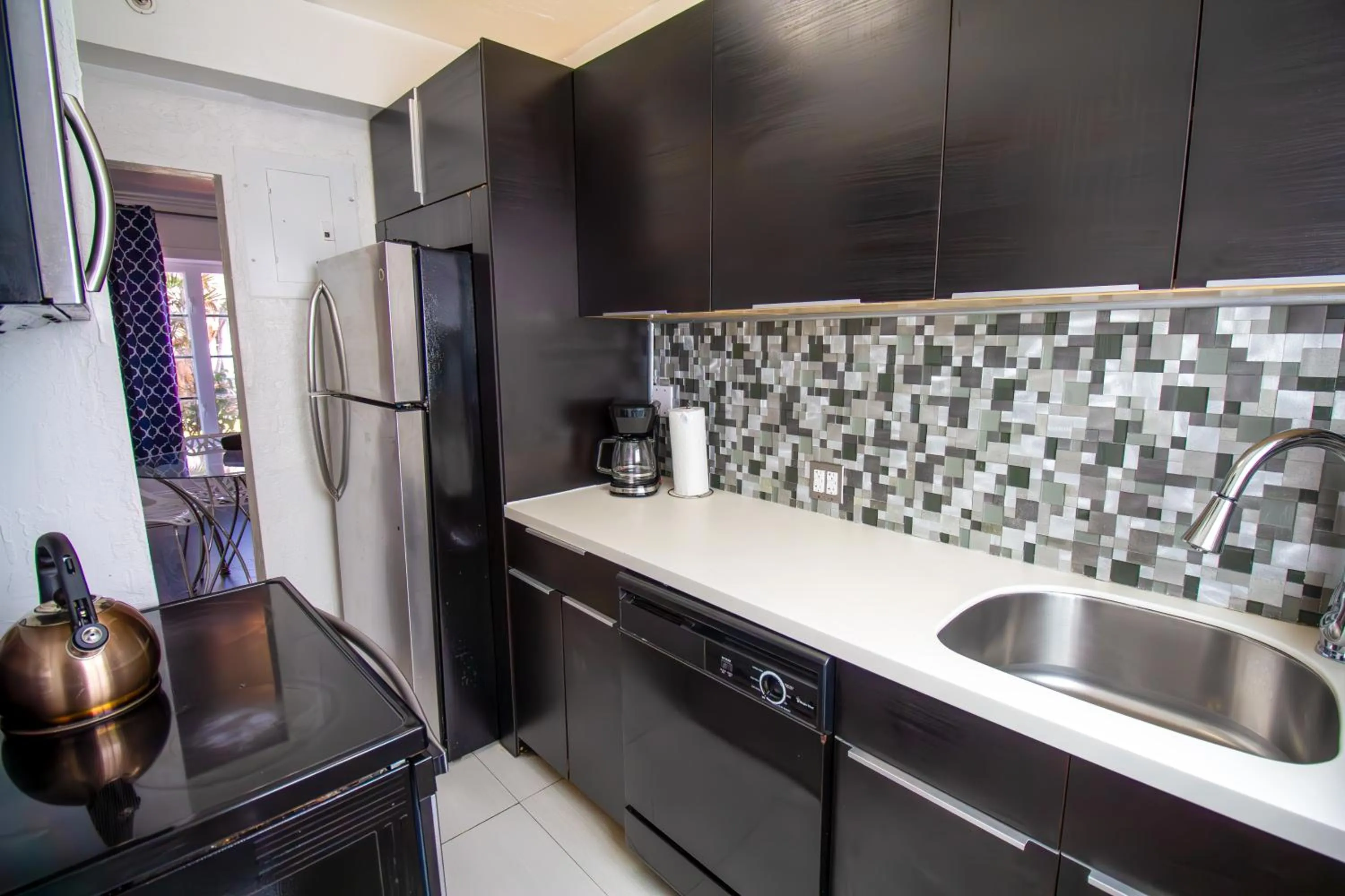 Kitchen or kitchenette in Courtyard Apartments Part of the Oasis Casita Collection