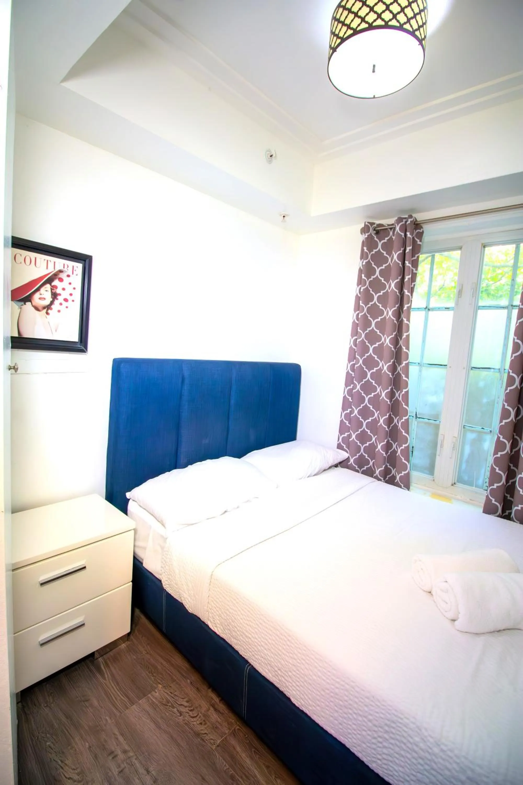 Bed in Courtyard Apartments Part of the Oasis Casita Collection