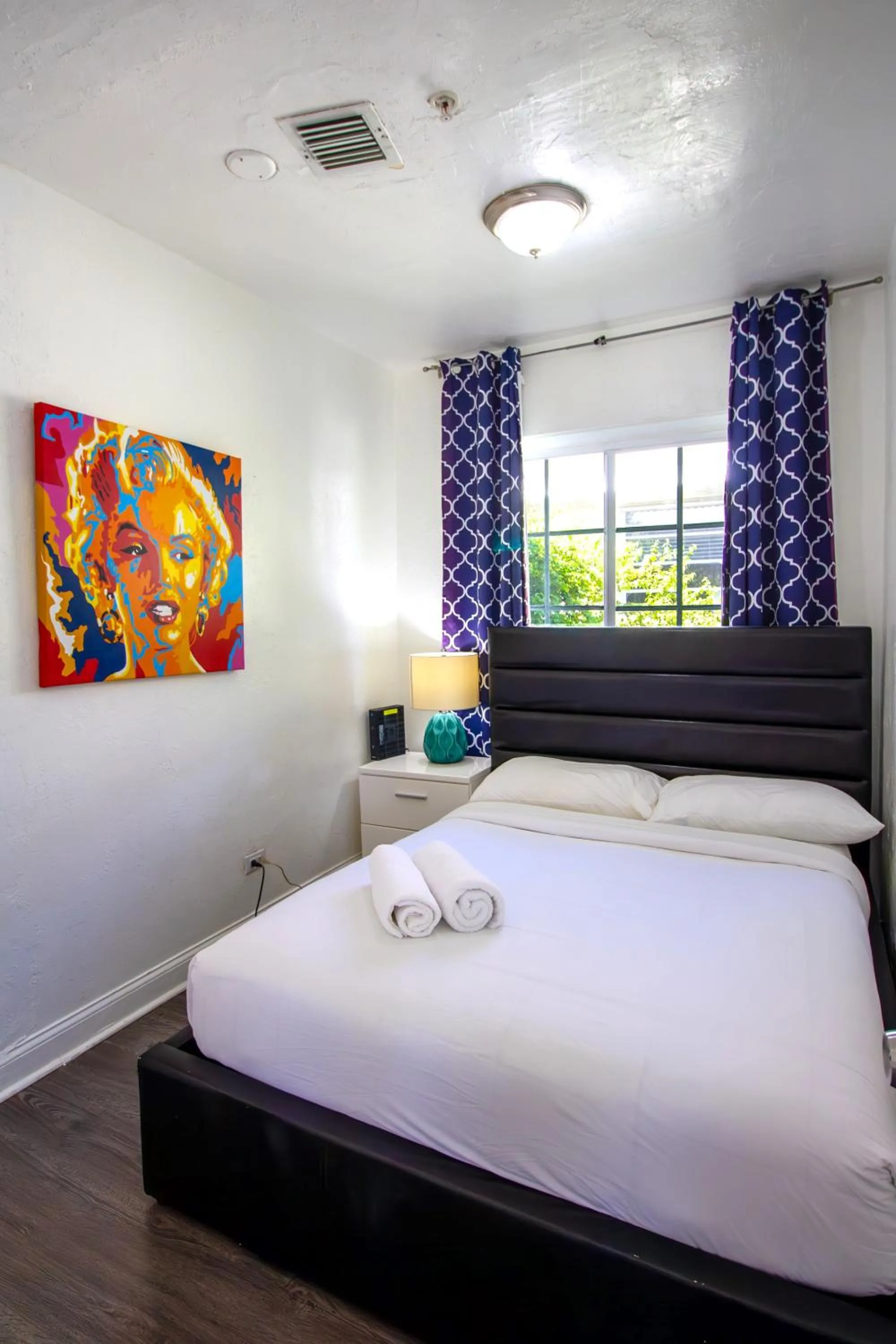 Bed in Courtyard Apartments Part of the Oasis Casita Collection