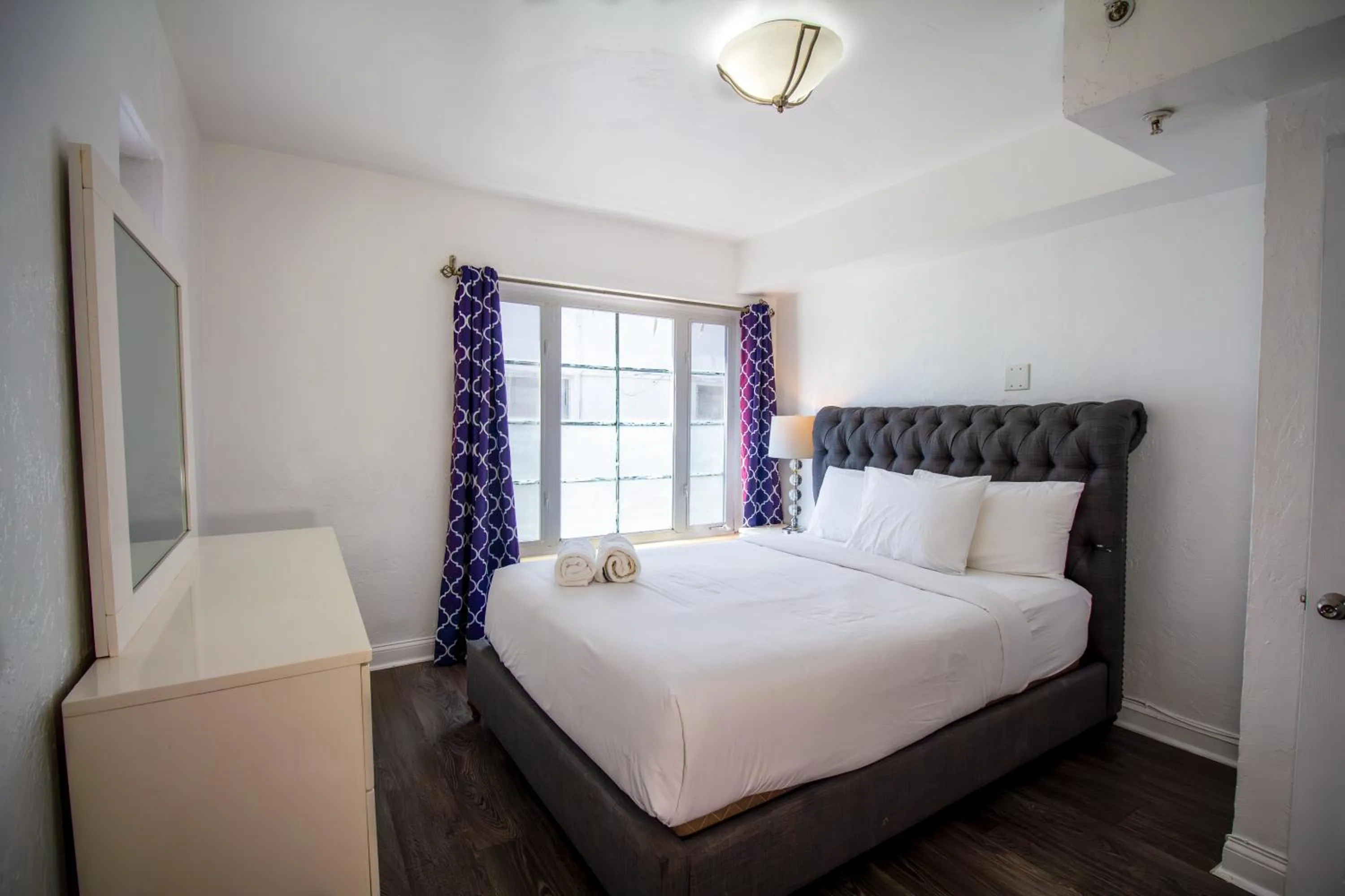 Bed in Courtyard Apartments Part of the Oasis Casita Collection