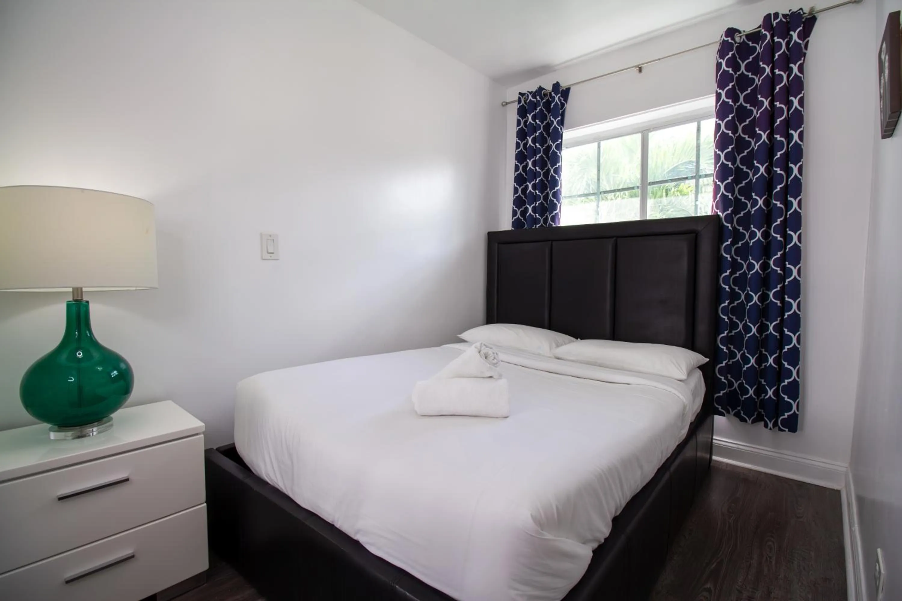 Bed in Courtyard Apartments Part of the Oasis Casita Collection