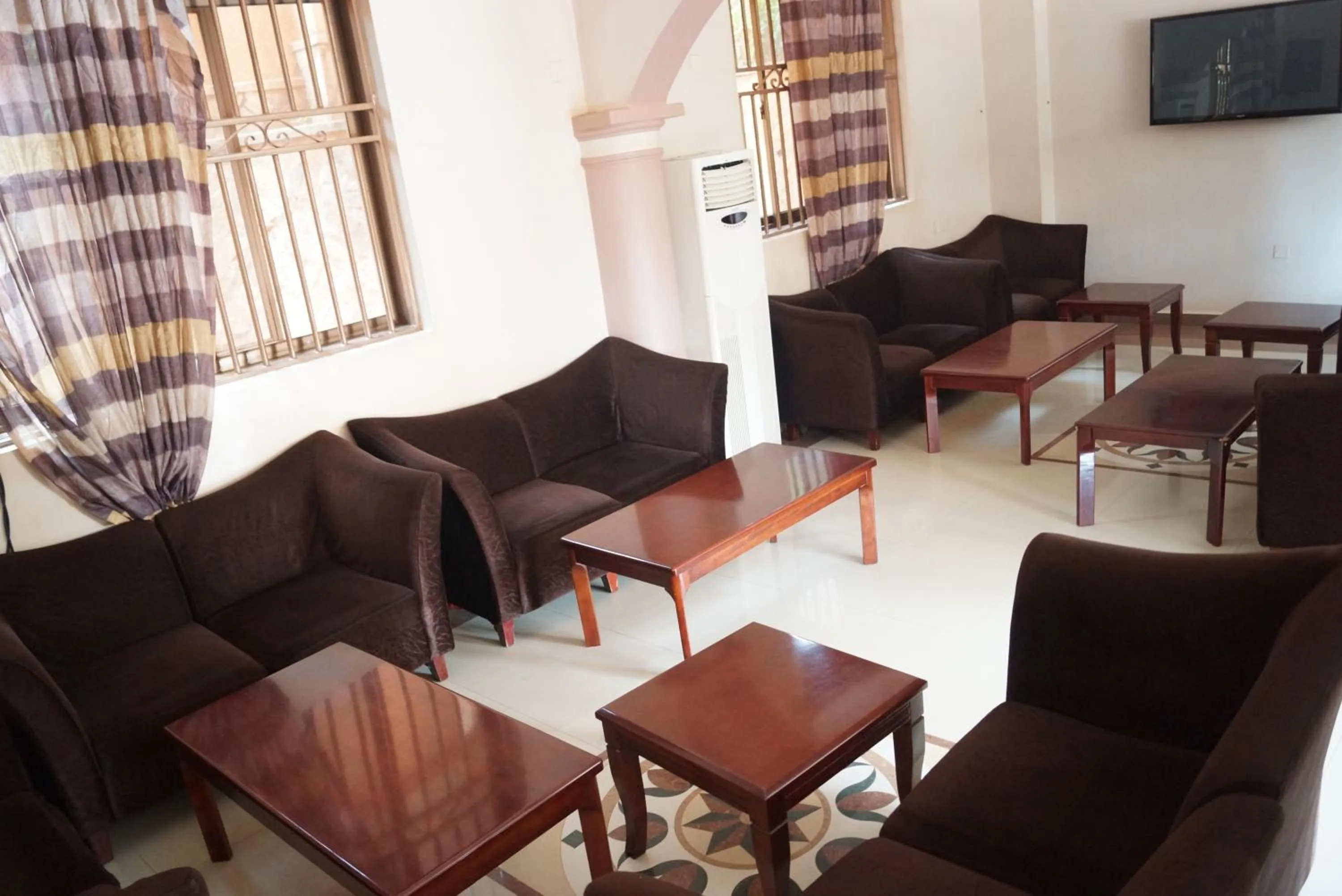 Communal lounge/ TV room in Tristar Hotel Kampala