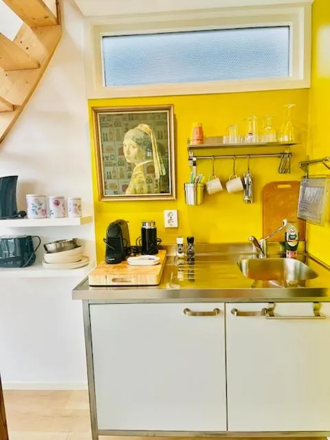 Kitchen or kitchenette in Houseboat studio with canalview and free bikes