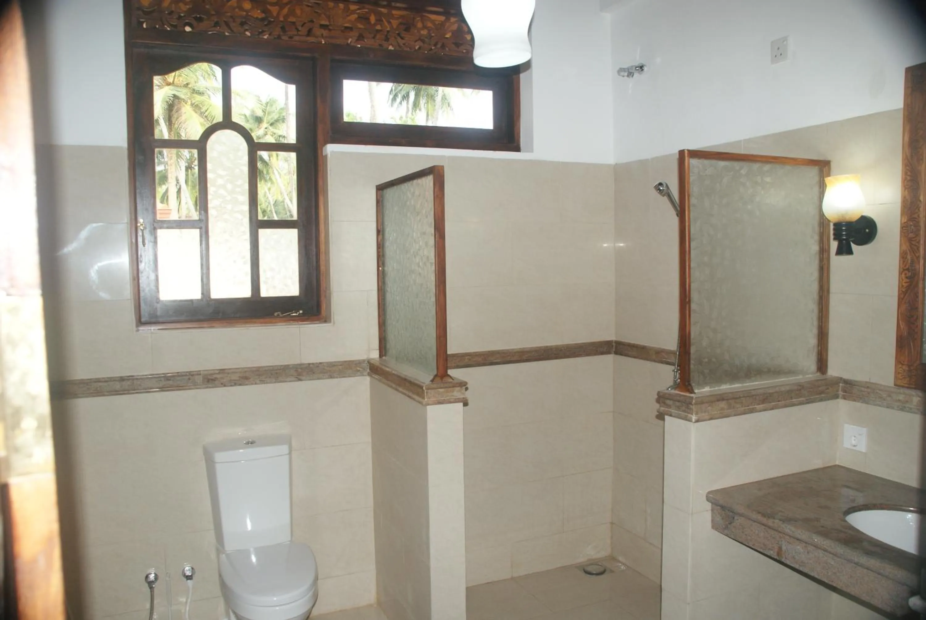 Bathroom in Lanka Beach Boutique Bungalows & Grand Villa