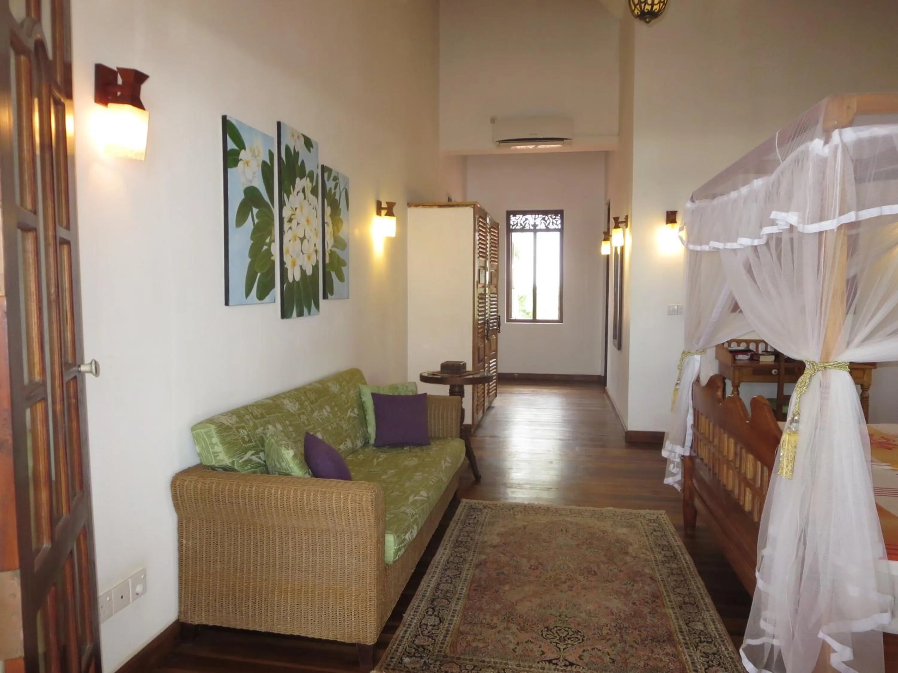 Bed in Lanka Beach Boutique Bungalows & Grand Villa