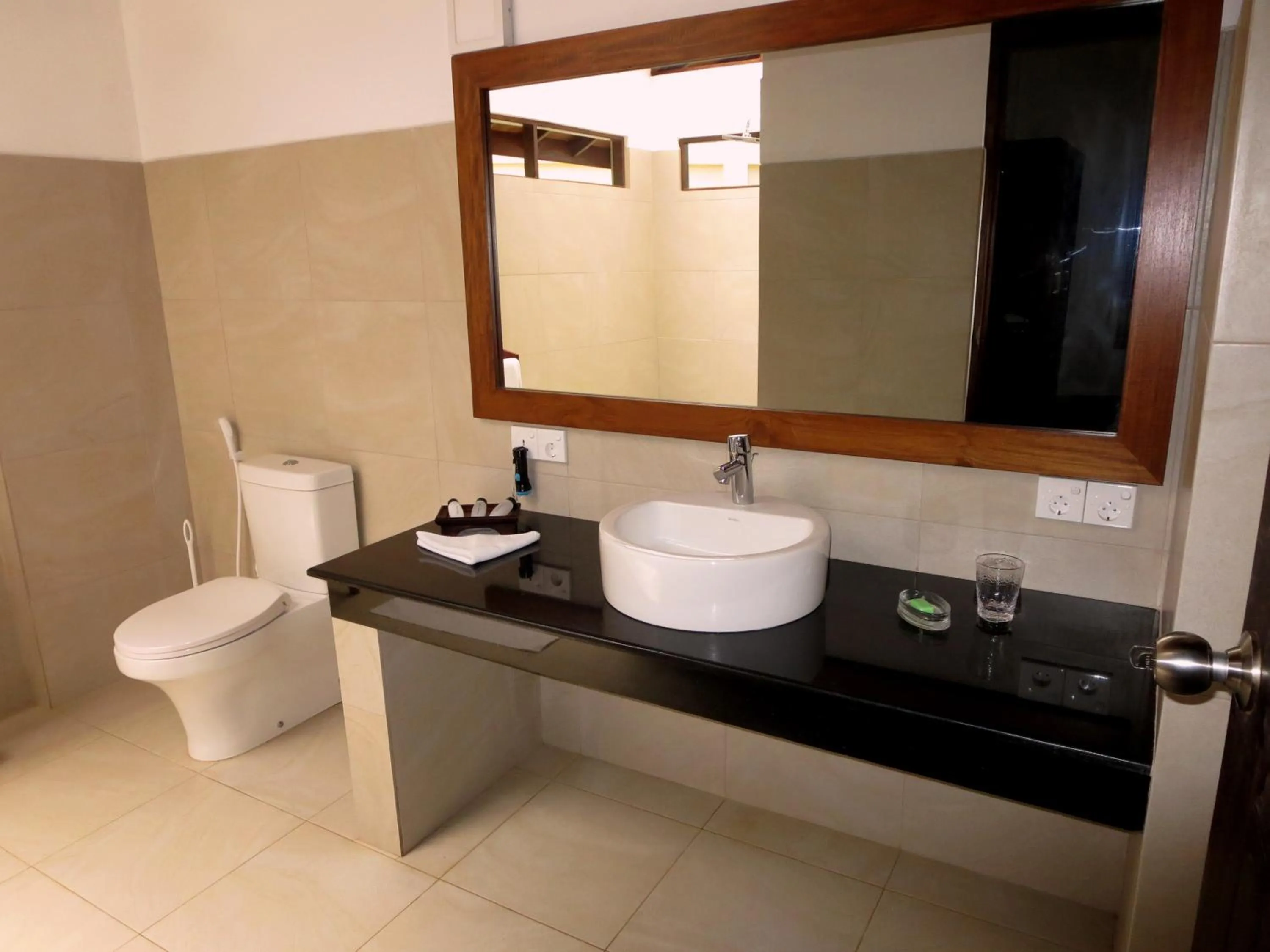 Bathroom in Lanka Beach Boutique Bungalows & Grand Villa