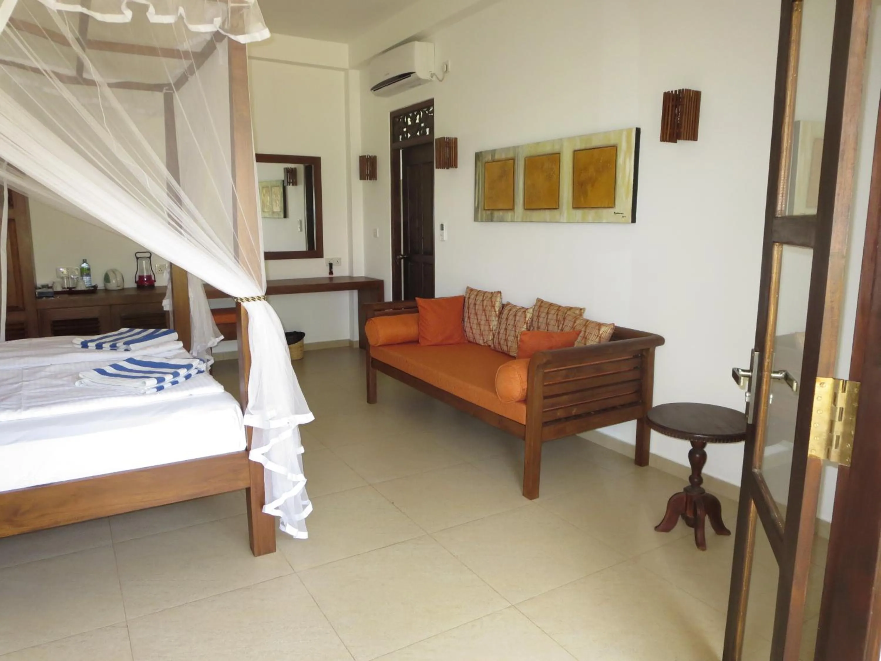 Bed in Lanka Beach Boutique Bungalows & Grand Villa