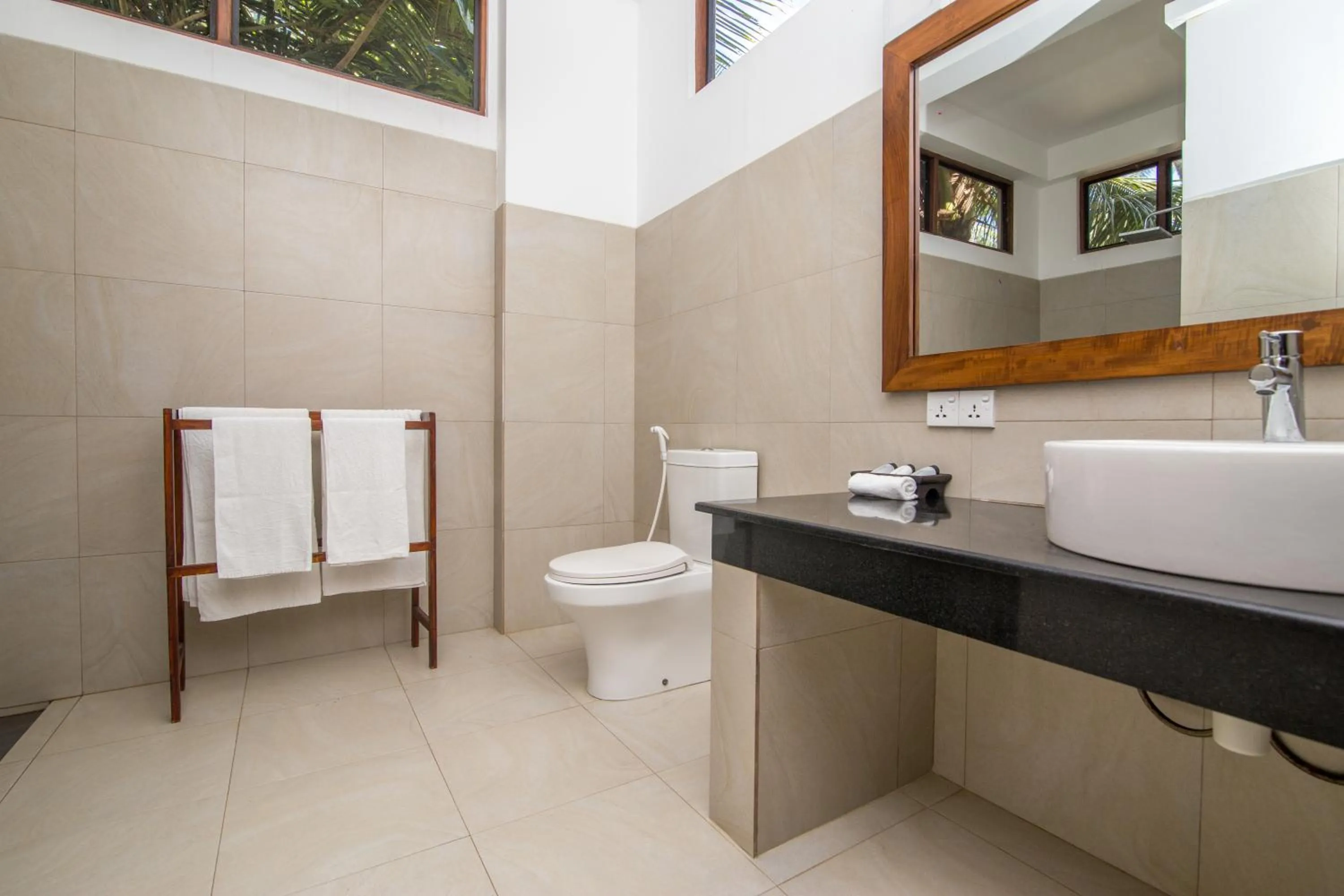 Bathroom in Lanka Beach Boutique Bungalows & Grand Villa