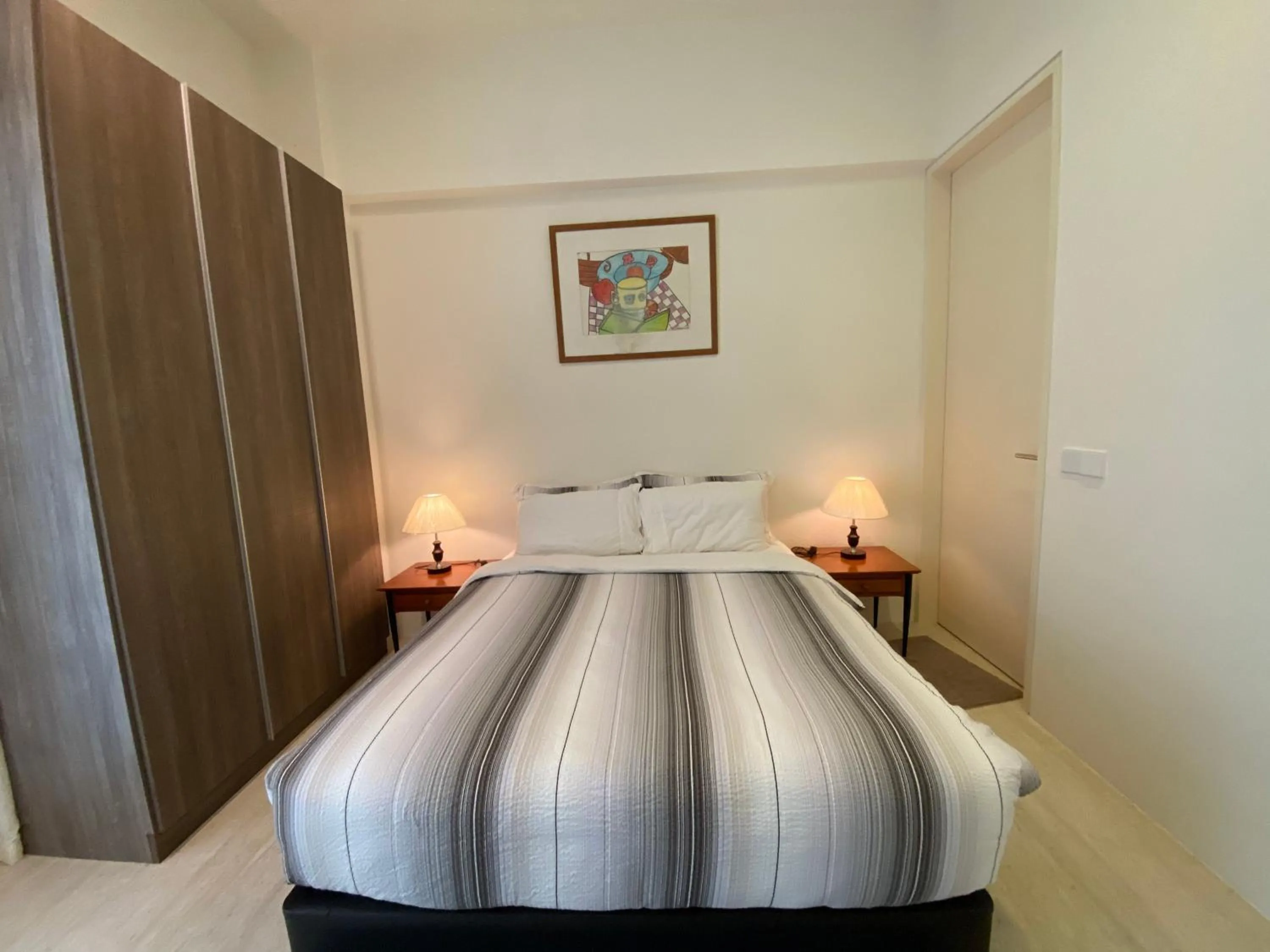 Bed in By The Sea @ Cozy Beachfront Home