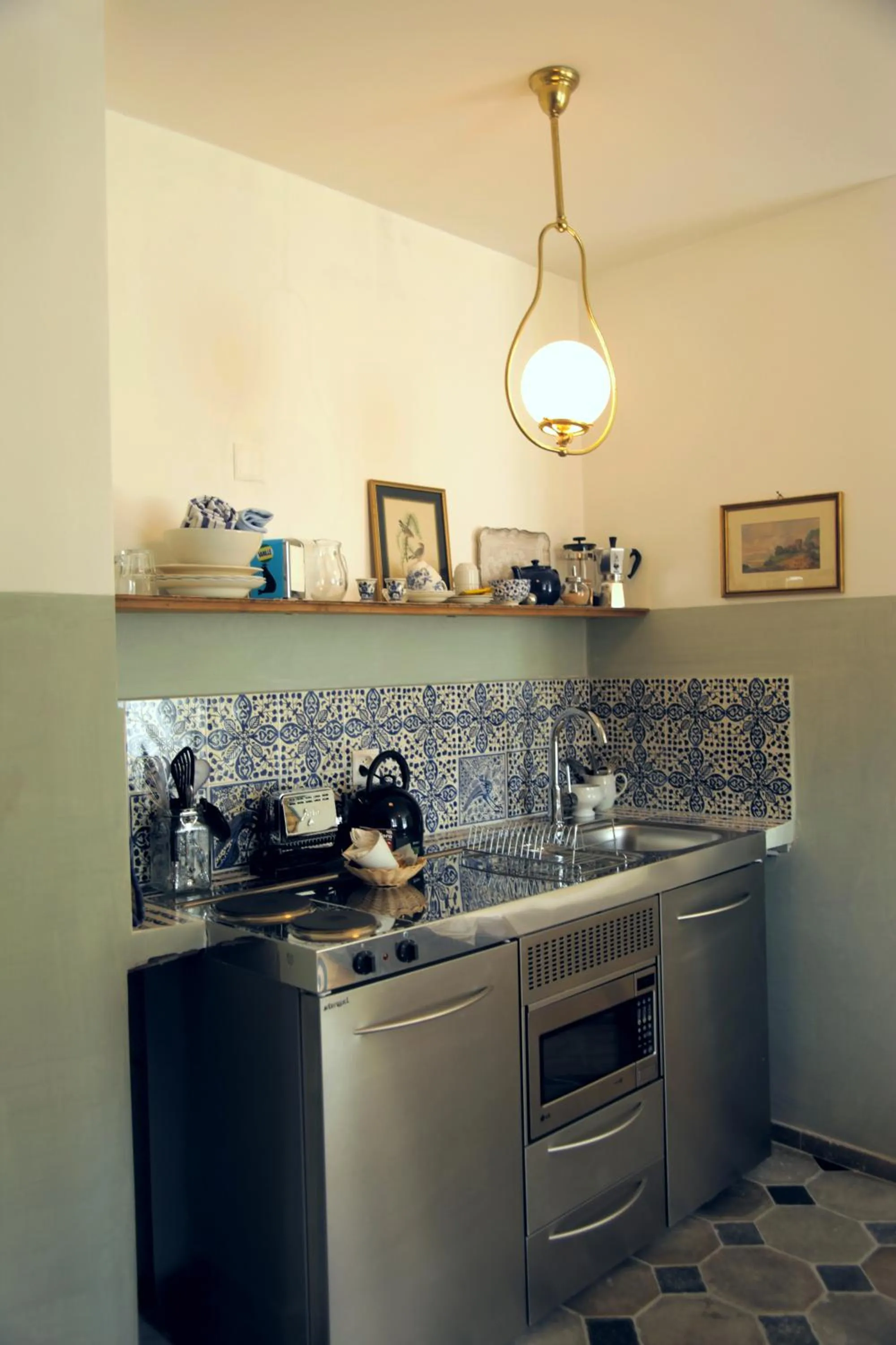 Kitchen or kitchenette in Boutique-Hotel Guesthouse Le Locle