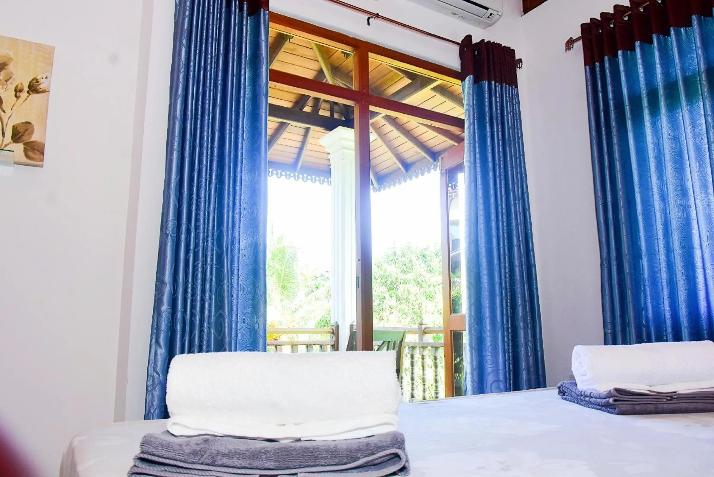 Bed in Arcadia Resort