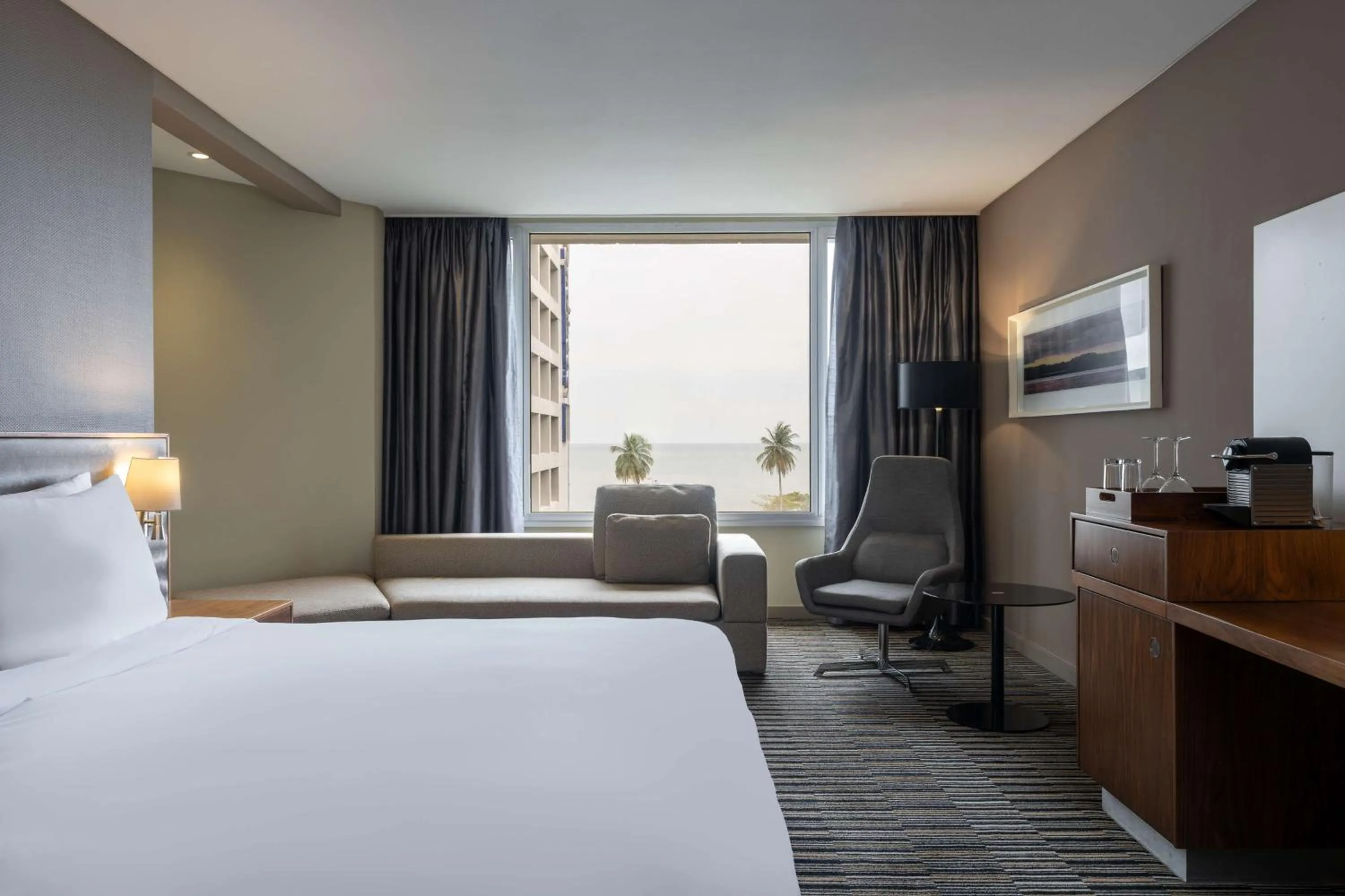 View (from property/room), Bed in Radisson Blu Okoume Palace Hotel, Libreville