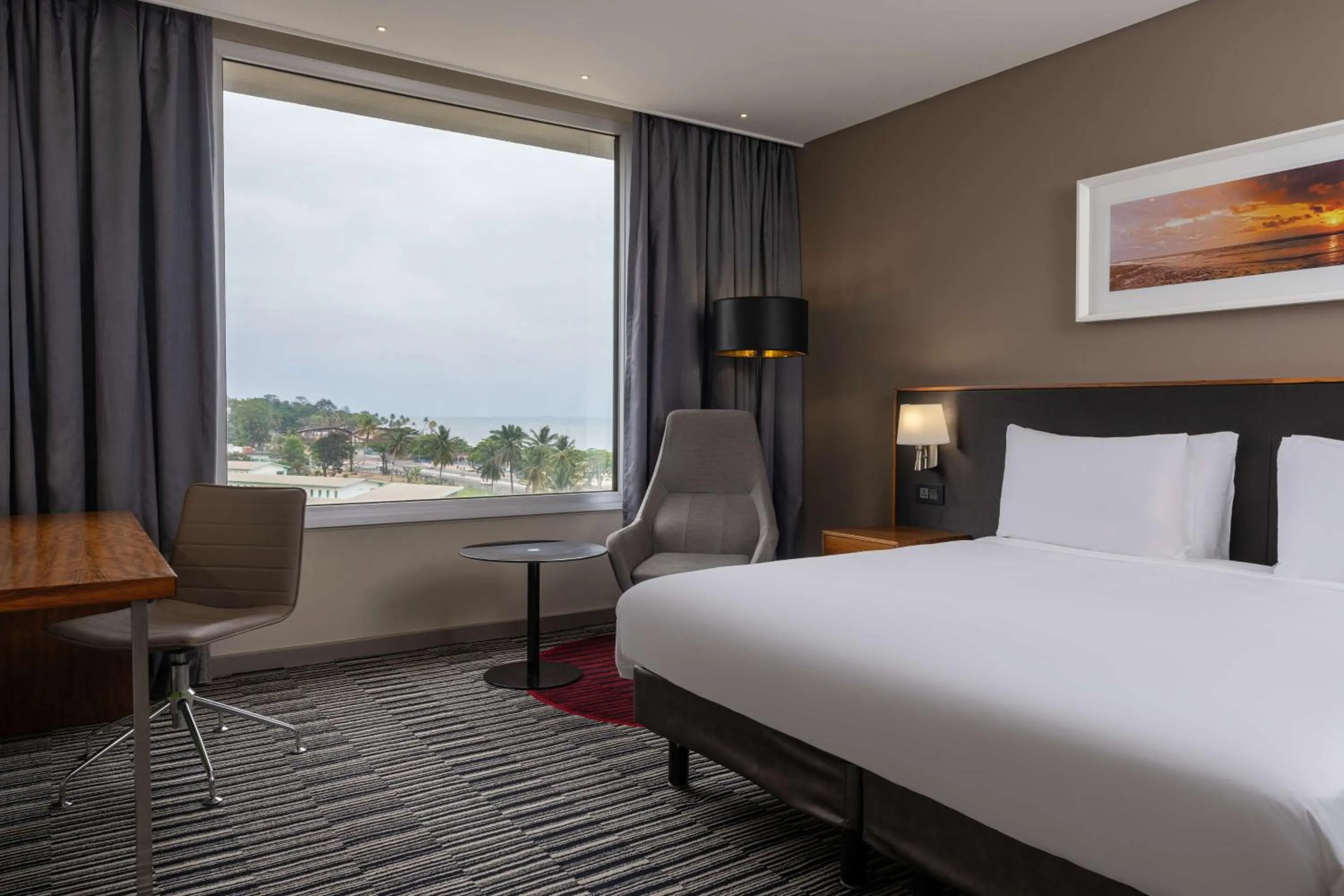 View (from property/room), Bed in Radisson Blu Okoume Palace Hotel, Libreville