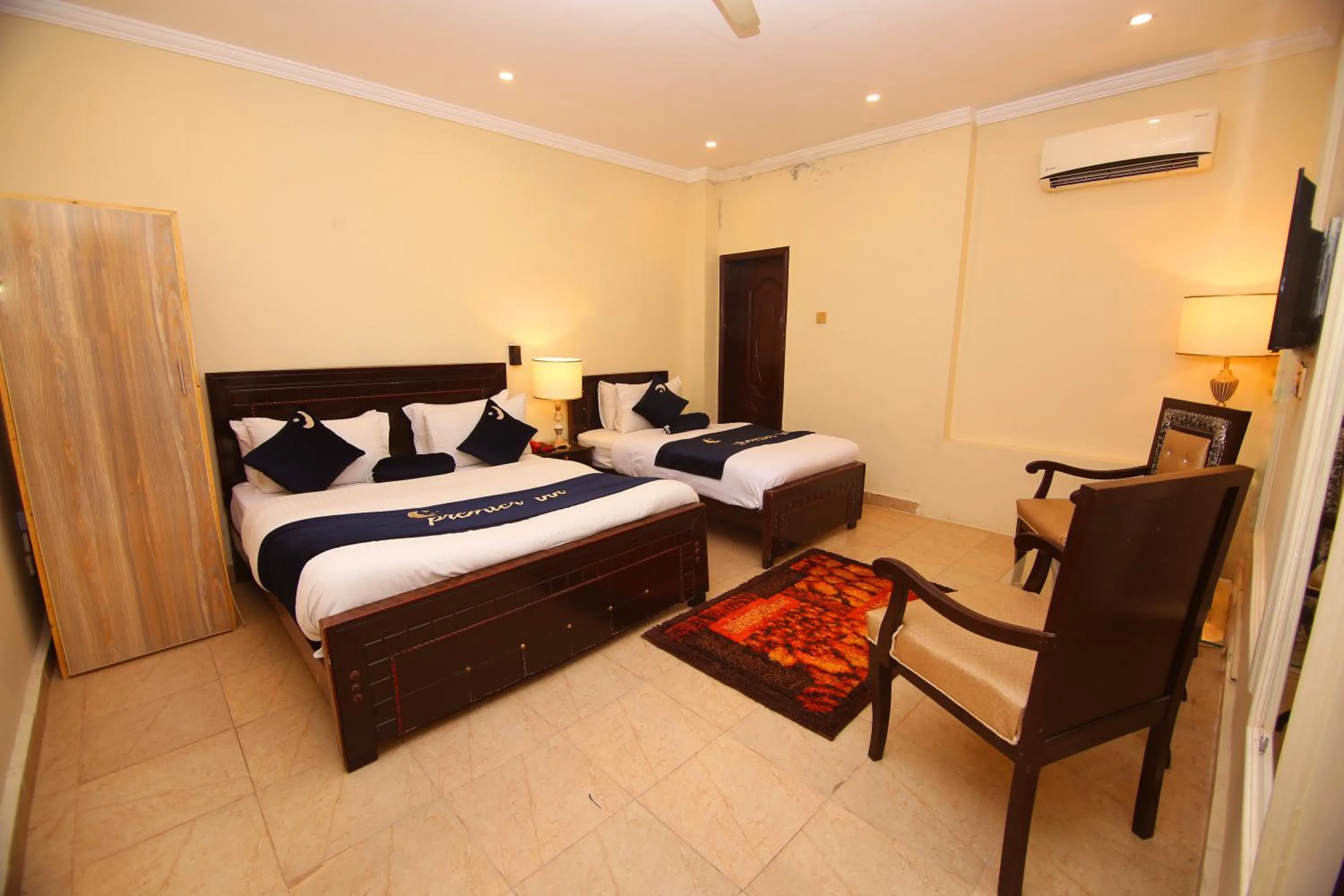 Bedroom, Bed in Premier Inn Johar Town Lahore
