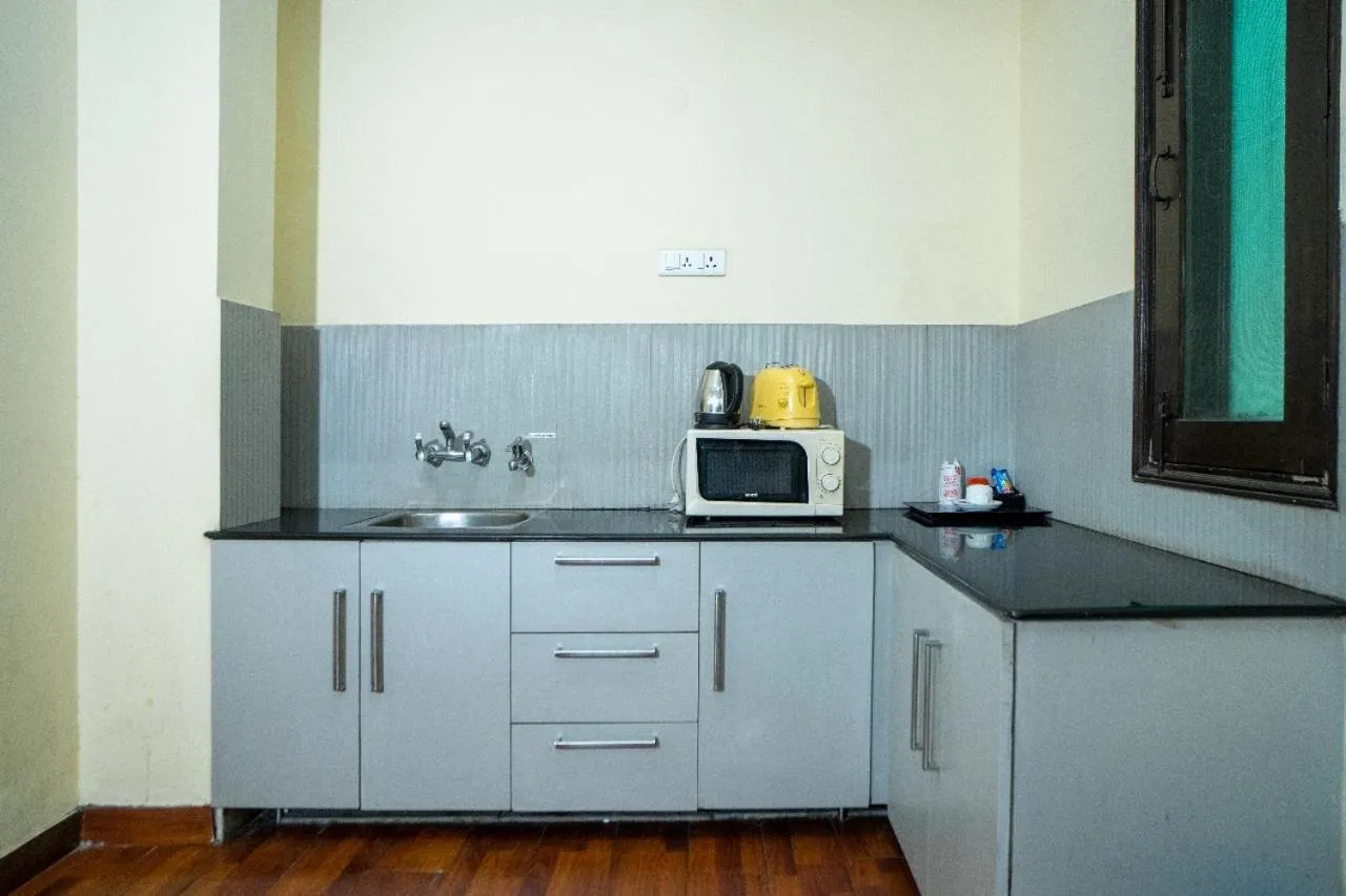 Kitchen or kitchenette in Enkay Residency V Block-Cyber City