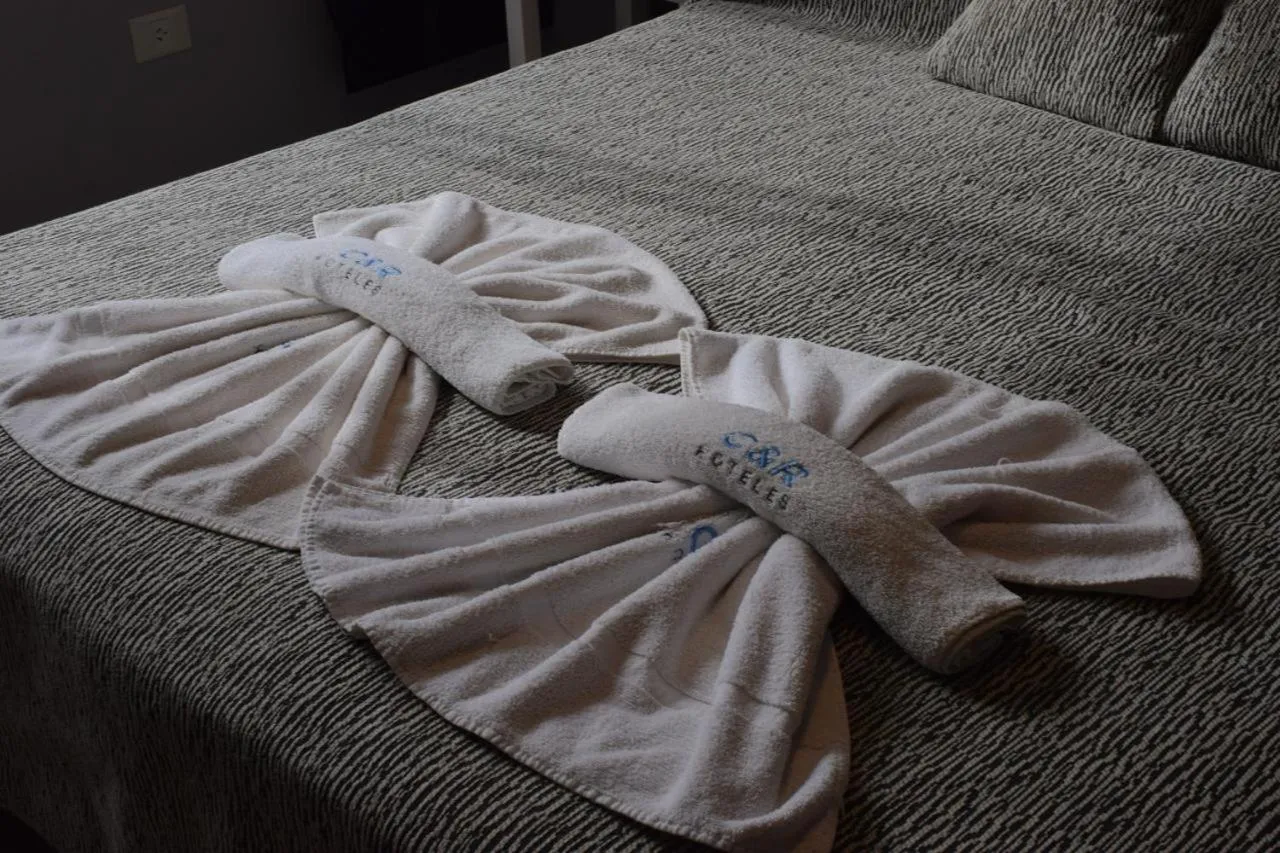 Bed in C&R Hoteles PDLA
