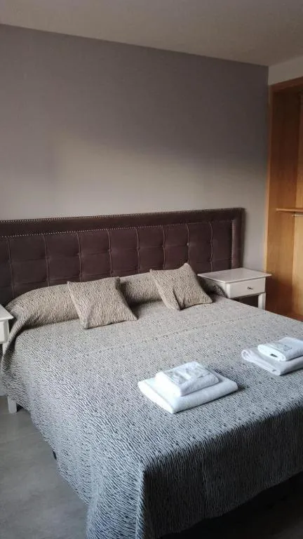 Bed in C&R Hoteles PDLA