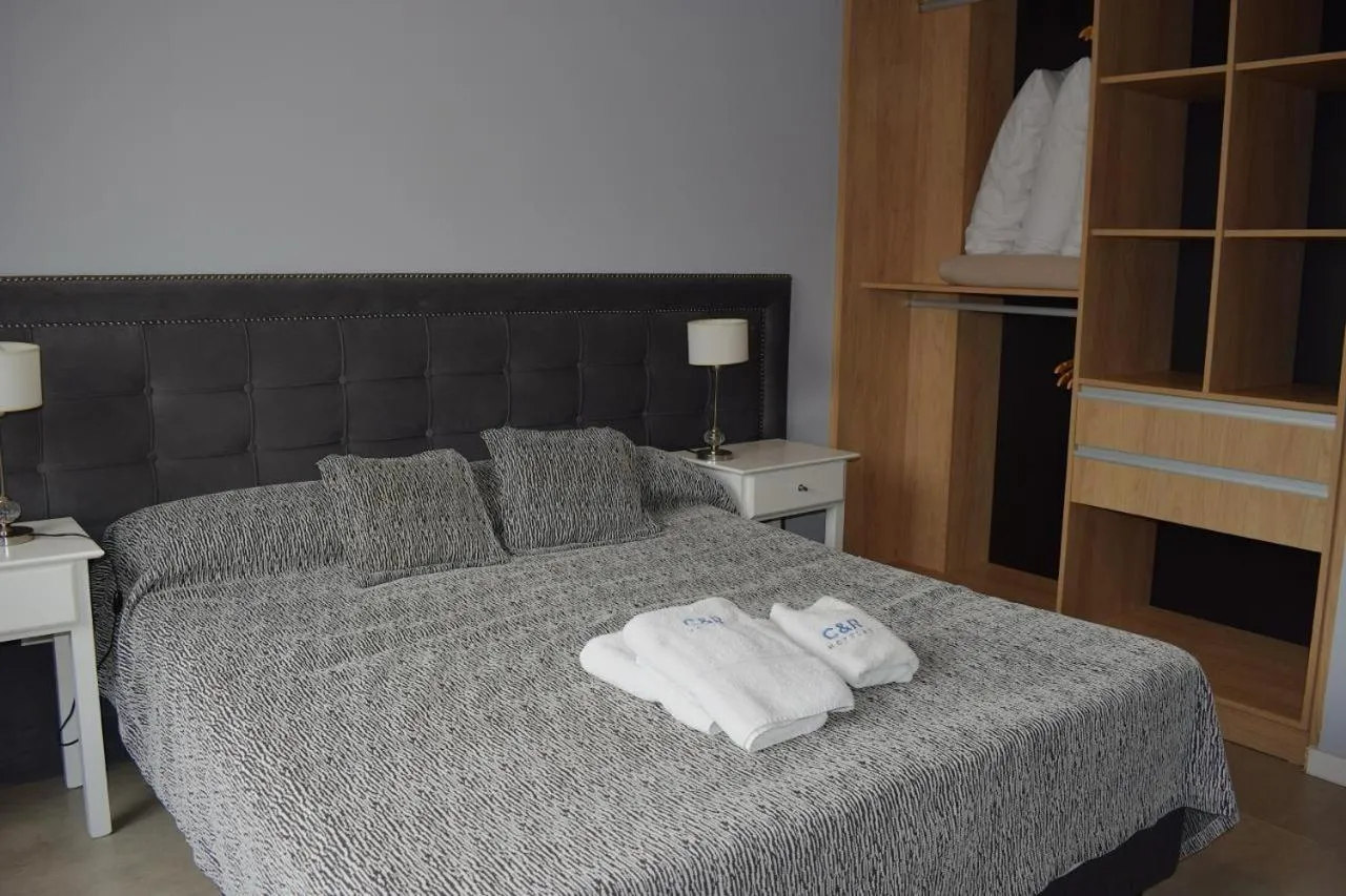 Bed in C&R Hoteles PDLA