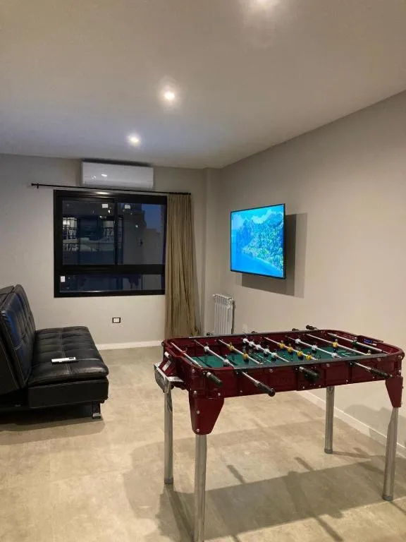 Communal lounge/ TV room in C&R Hoteles PDLA