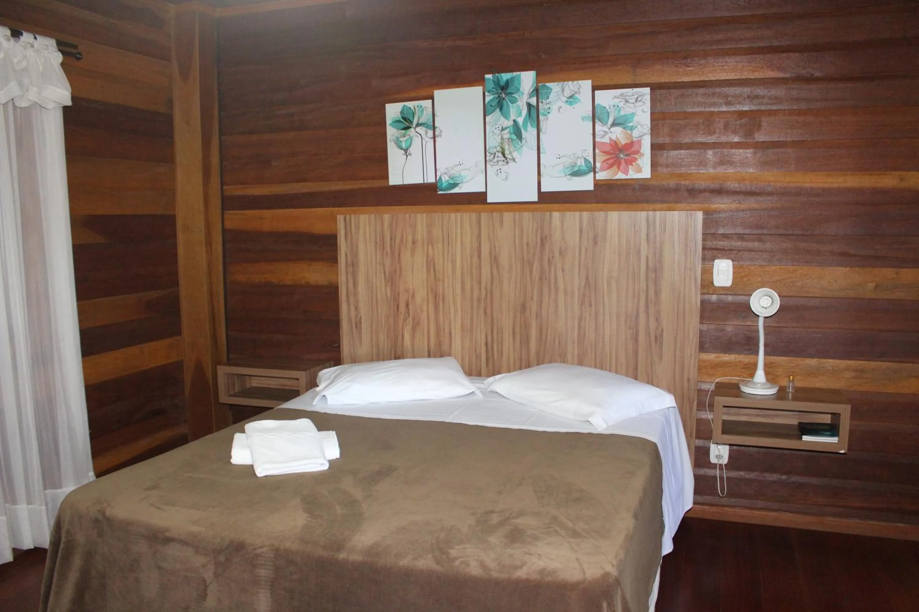 Bedroom in Pousada Floresta Negra