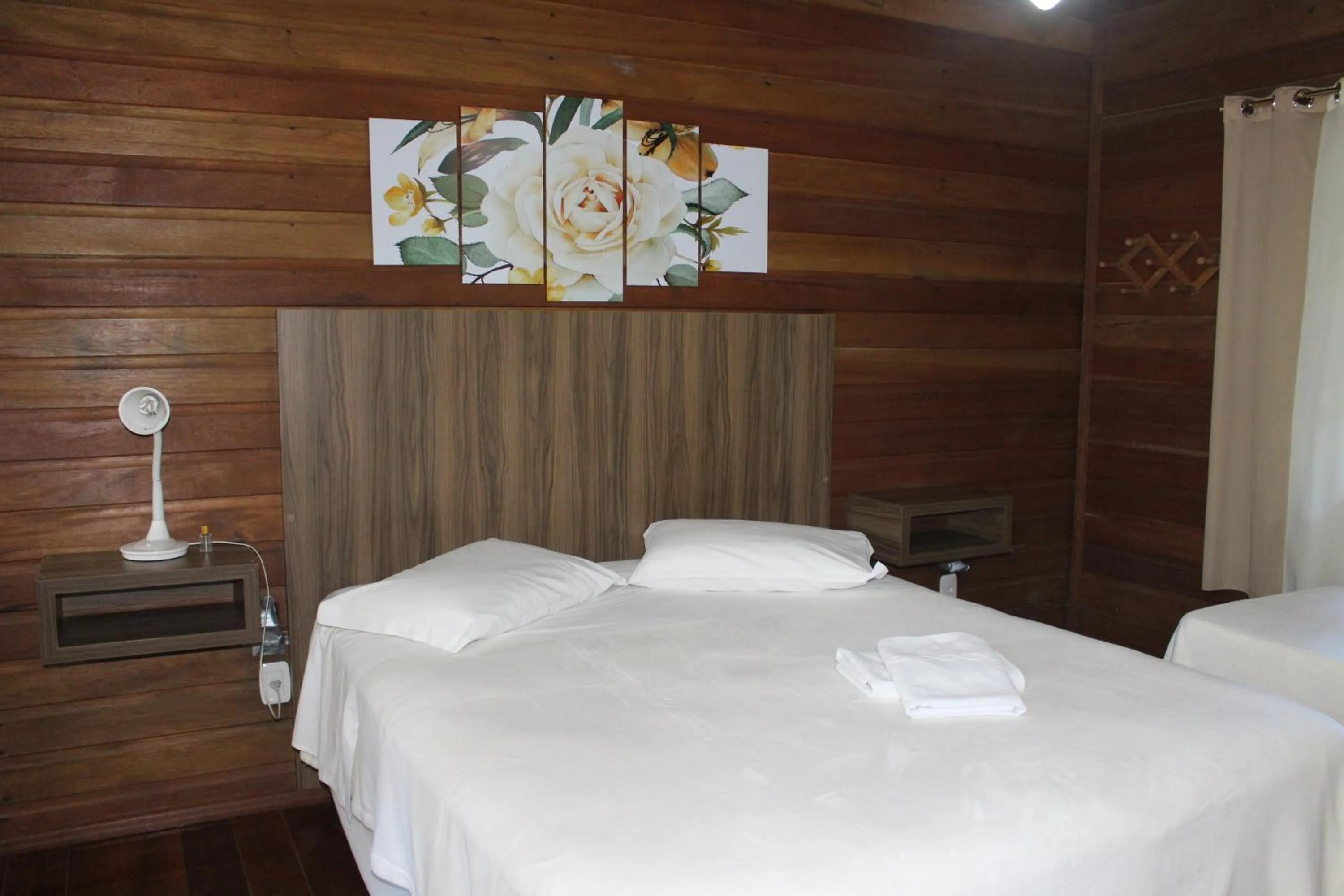 Bedroom in Pousada Floresta Negra