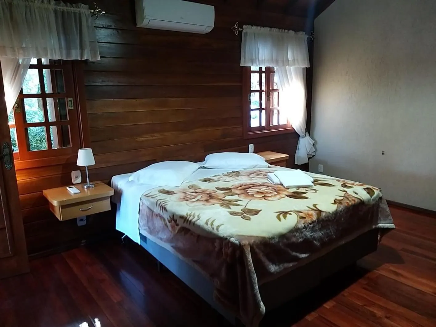 Bed in Pousada Floresta Negra