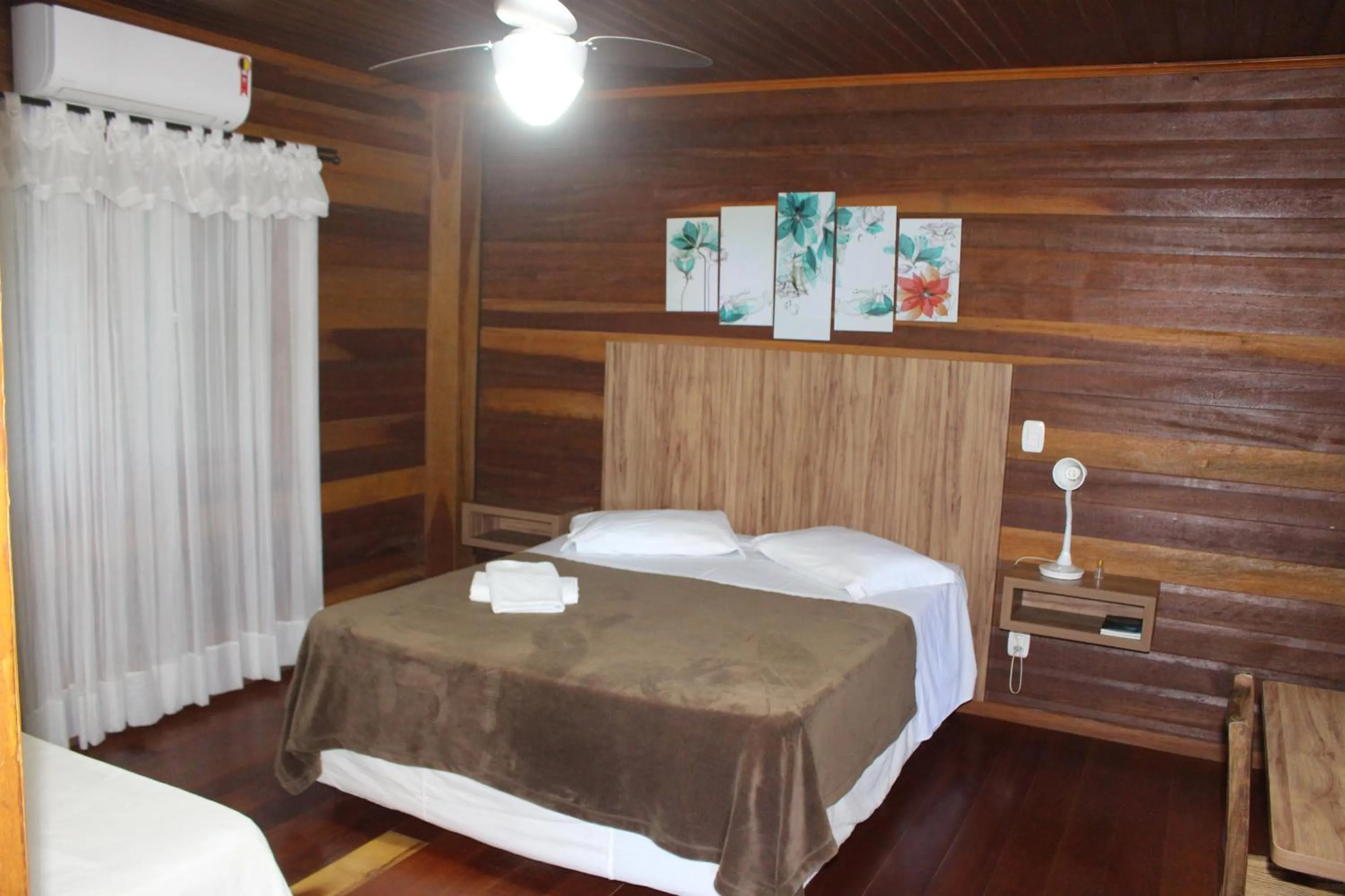 Bedroom in Pousada Floresta Negra