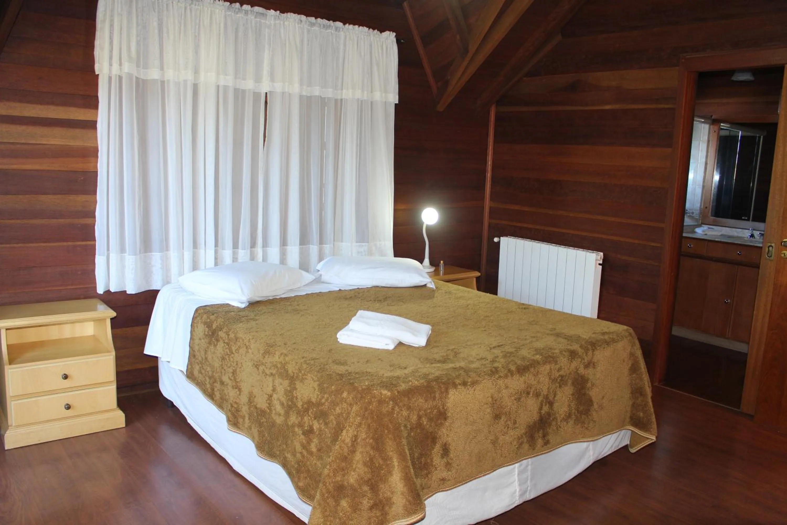 Bedroom in Pousada Floresta Negra