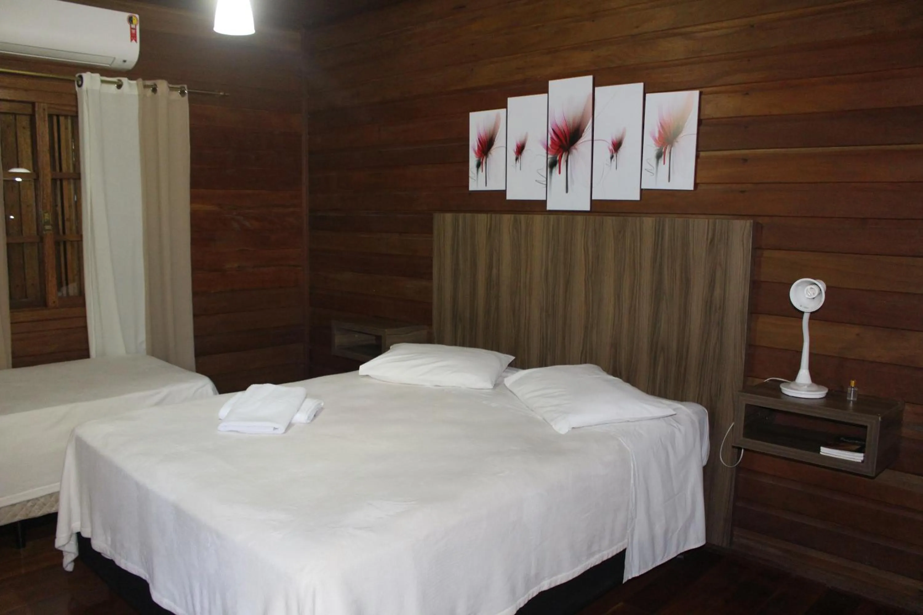 Bedroom in Pousada Floresta Negra