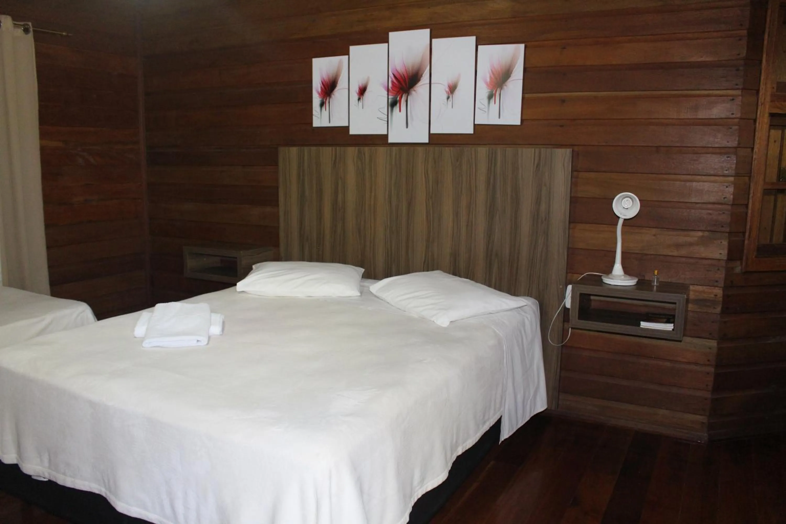 Bedroom in Pousada Floresta Negra