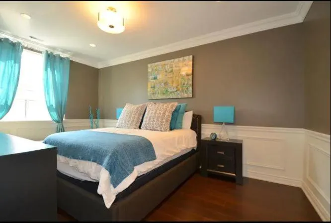 Bed in The SoMa Furnished Residences