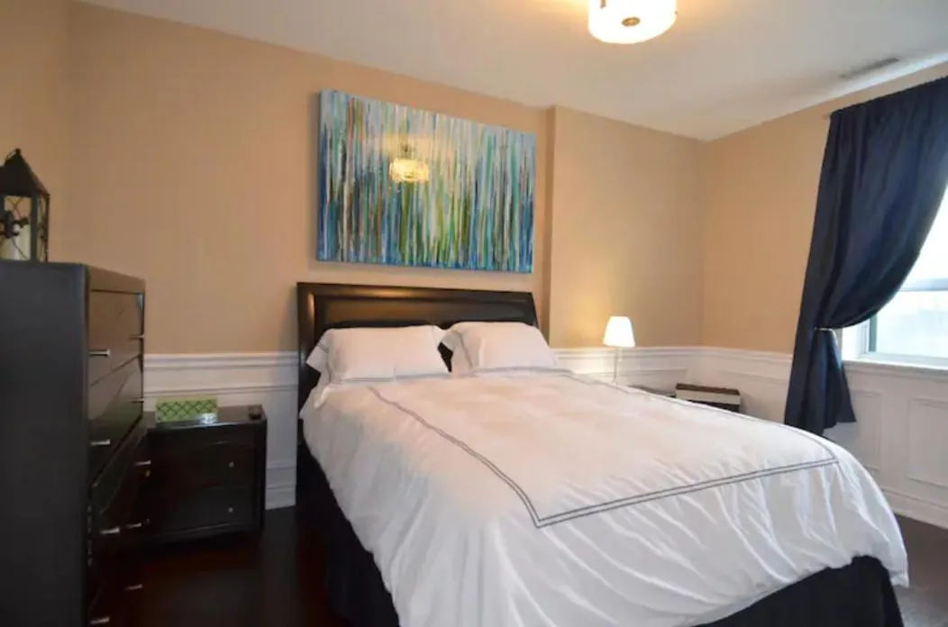 Bed in The SoMa Furnished Residences