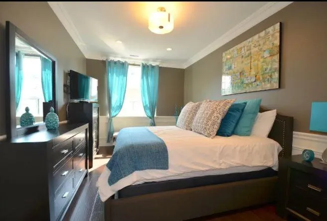 Bed in The SoMa Furnished Residences
