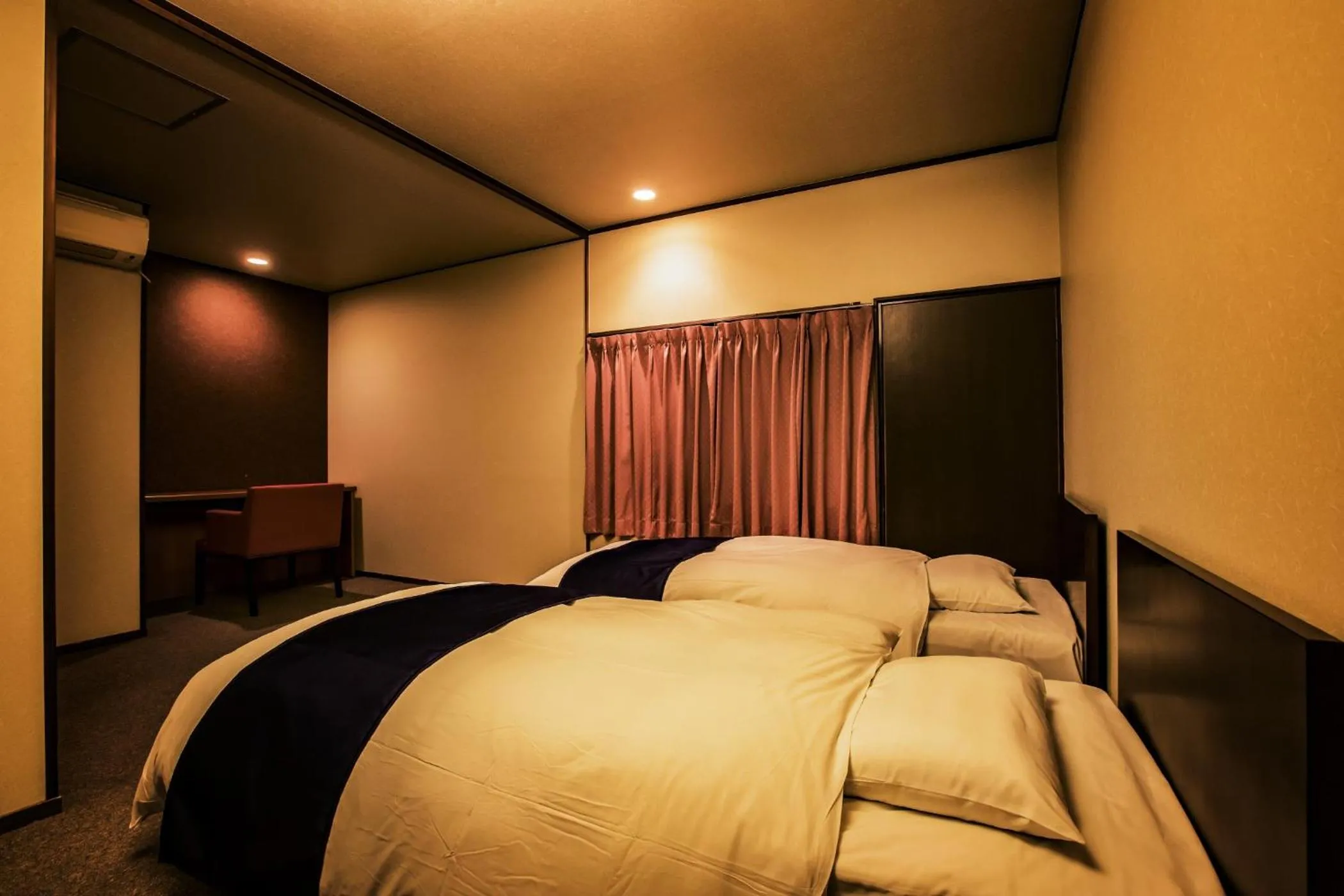 Photo of the whole room, Bed in Ooedo Onsen Monogatari Gero Bekkan