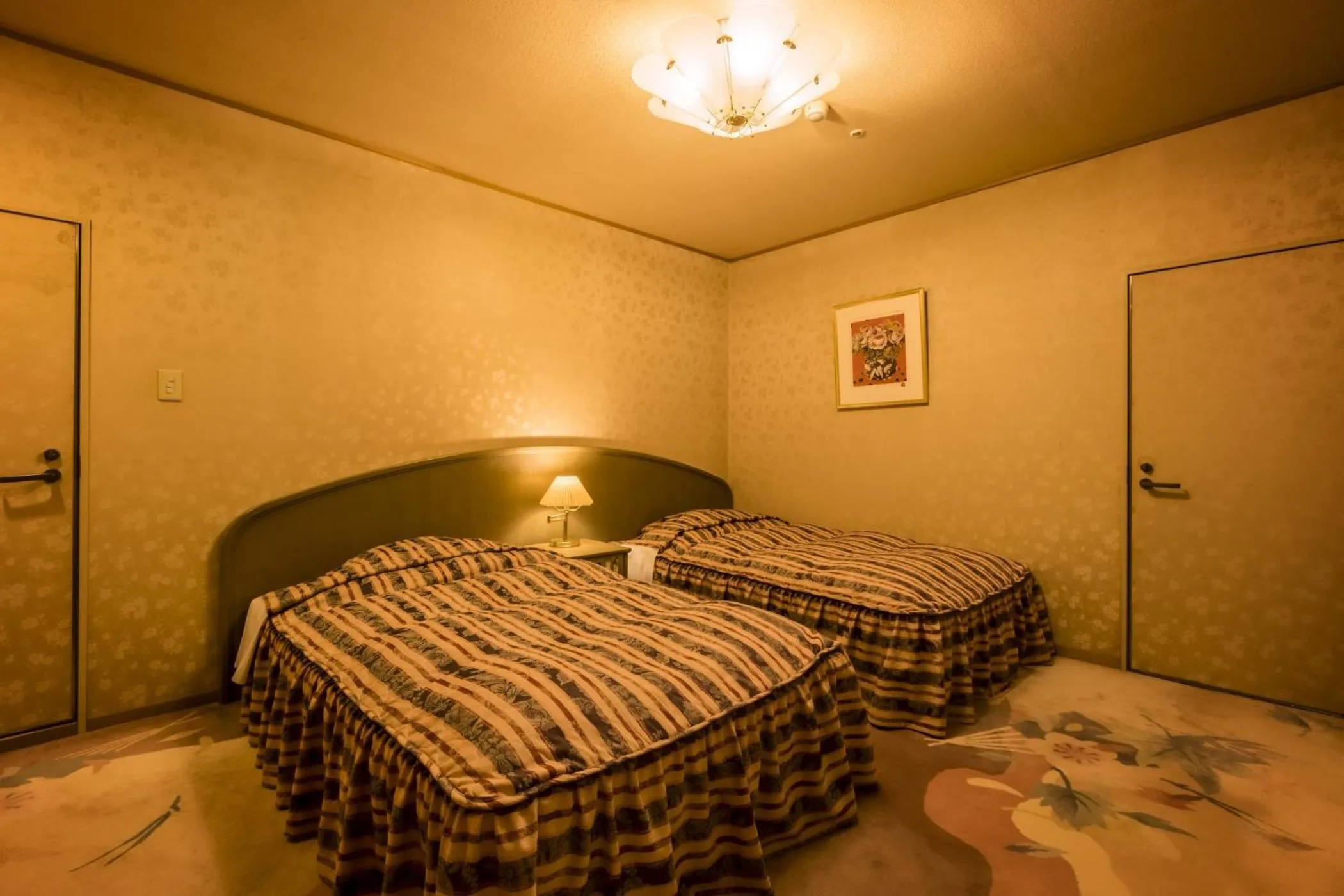 Photo of the whole room, Bed in Ooedo Onsen Monogatari Premium Saiki Bekkan