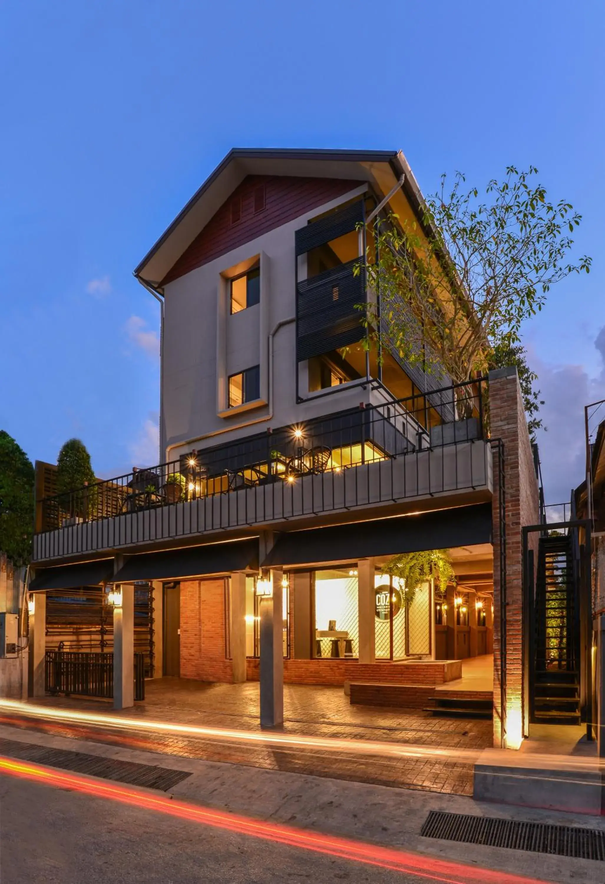 Property building in Cozy Inn Chiang Mai Property building in Cozy Inn Chiang Mai