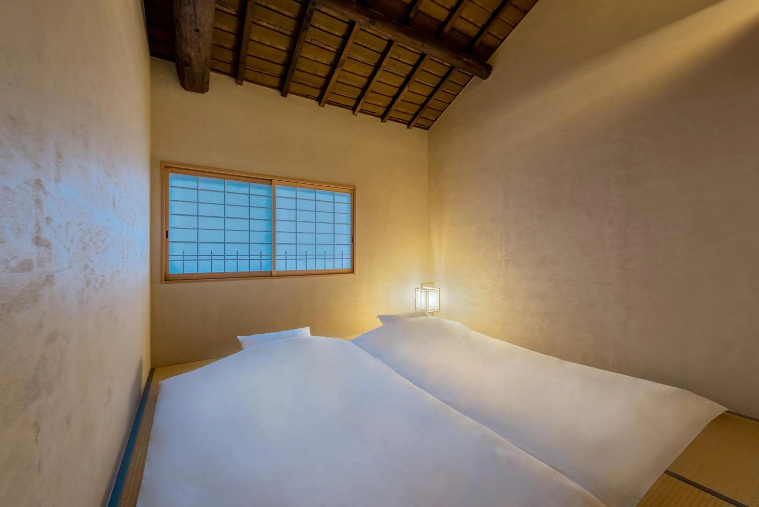 Photo of the whole room, Bed in Choya Chawanzaka Machiya House